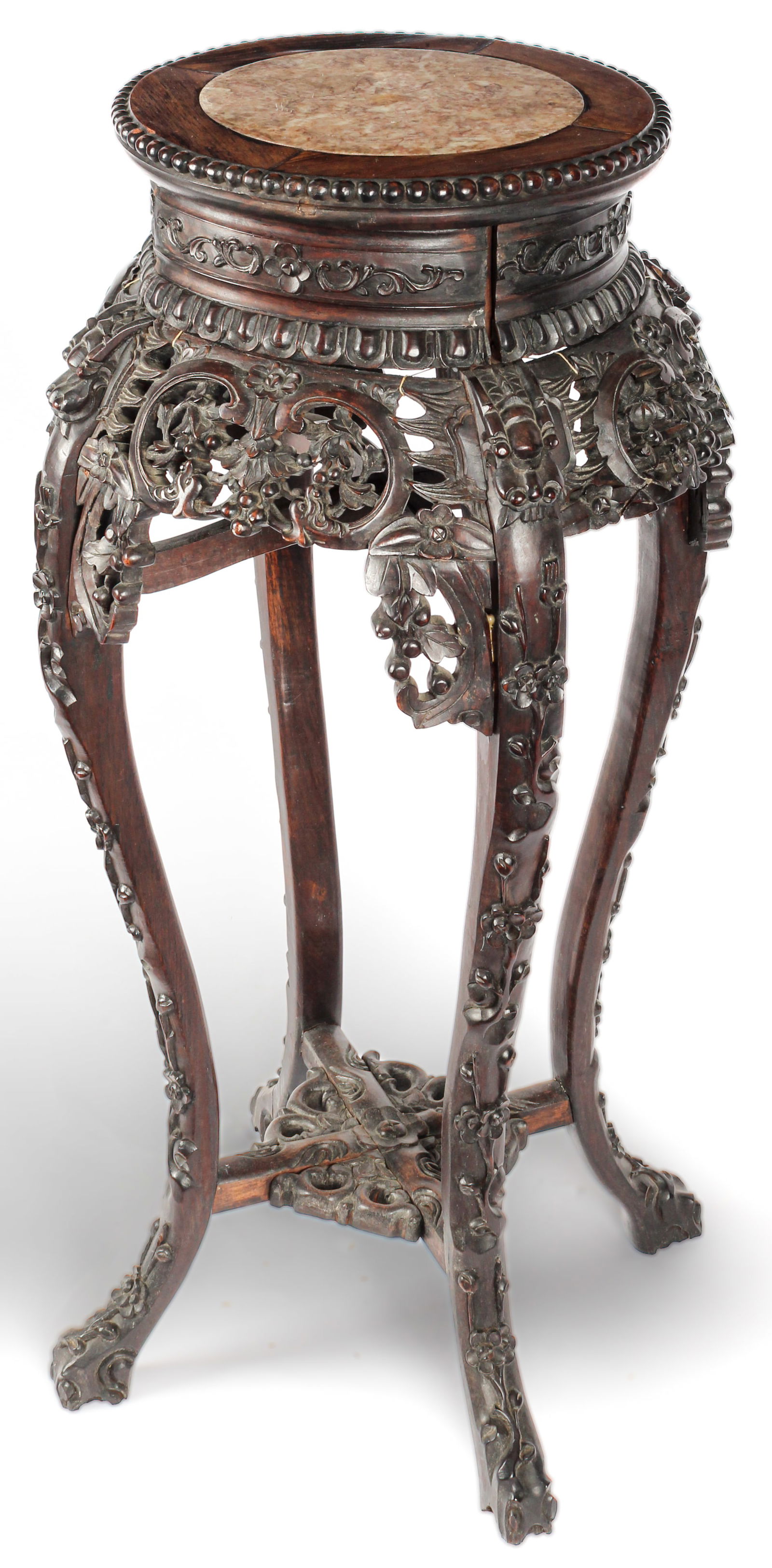 Antique Chinese Carved Hardwood and Marble Top Stand: Description: An antique Chinese carved hardwood and 'rouge' marble-top stand featuring cabriole legs, an ornately carved stretcher, a reticulated floral apron, vine motifs down legs, beading around th