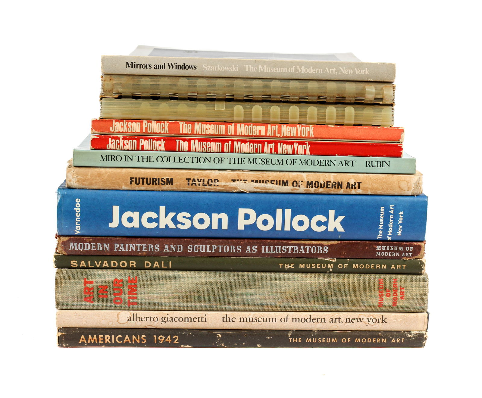 Group of Thirteen Early Museum of Modern Art Publications: Description: Group of thirteen early Museum of Modern Art (MoMA) publications, including three exhibition guides on Jackson Pollock, books on Dali, Giacometti, and Miro, and two copies of The Design C