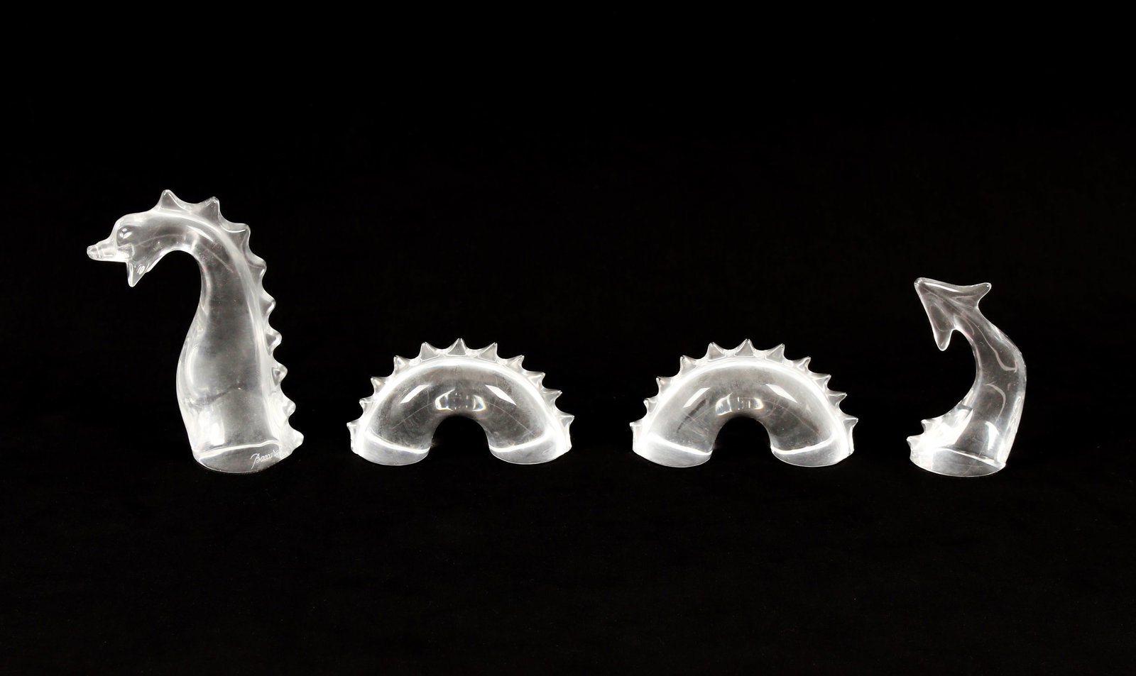 Baccarat Loch Ness Monster Crystal Figurine in Box: Description: A Baccarat crystal figurine of the Loch Ness monster, comprised of four separate pieces, with its original box. Markings & Inscriptions: MarkedDate: Circa 1990 Maker: Baccarat Dimensions: