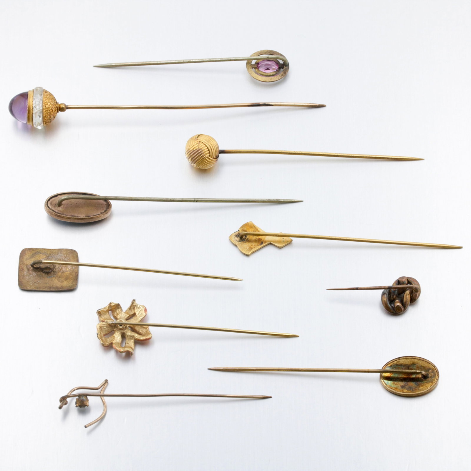 Group of Gold-filled and Costume Stick Pins: Description: Group of Misc. Jewelry, costume, and gold-filled stick pins. Markings & Inscriptions: None Visible Date: Various, mostly early to mid-20th century. Maker: Unknown Dimensions: Gross weight