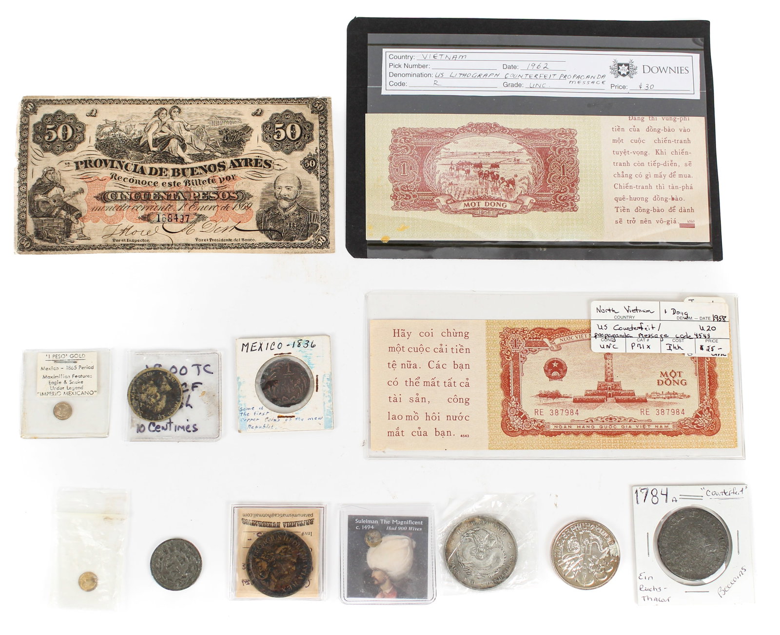 International Currency Including Silver: Description: A collection of international currency, including a 2013 Austrian 1.5 Euro silver coin, a Medieval Turkish silver coin, a 1906 Swiss two franc silver coin, two 1865 Maximilian one peso re