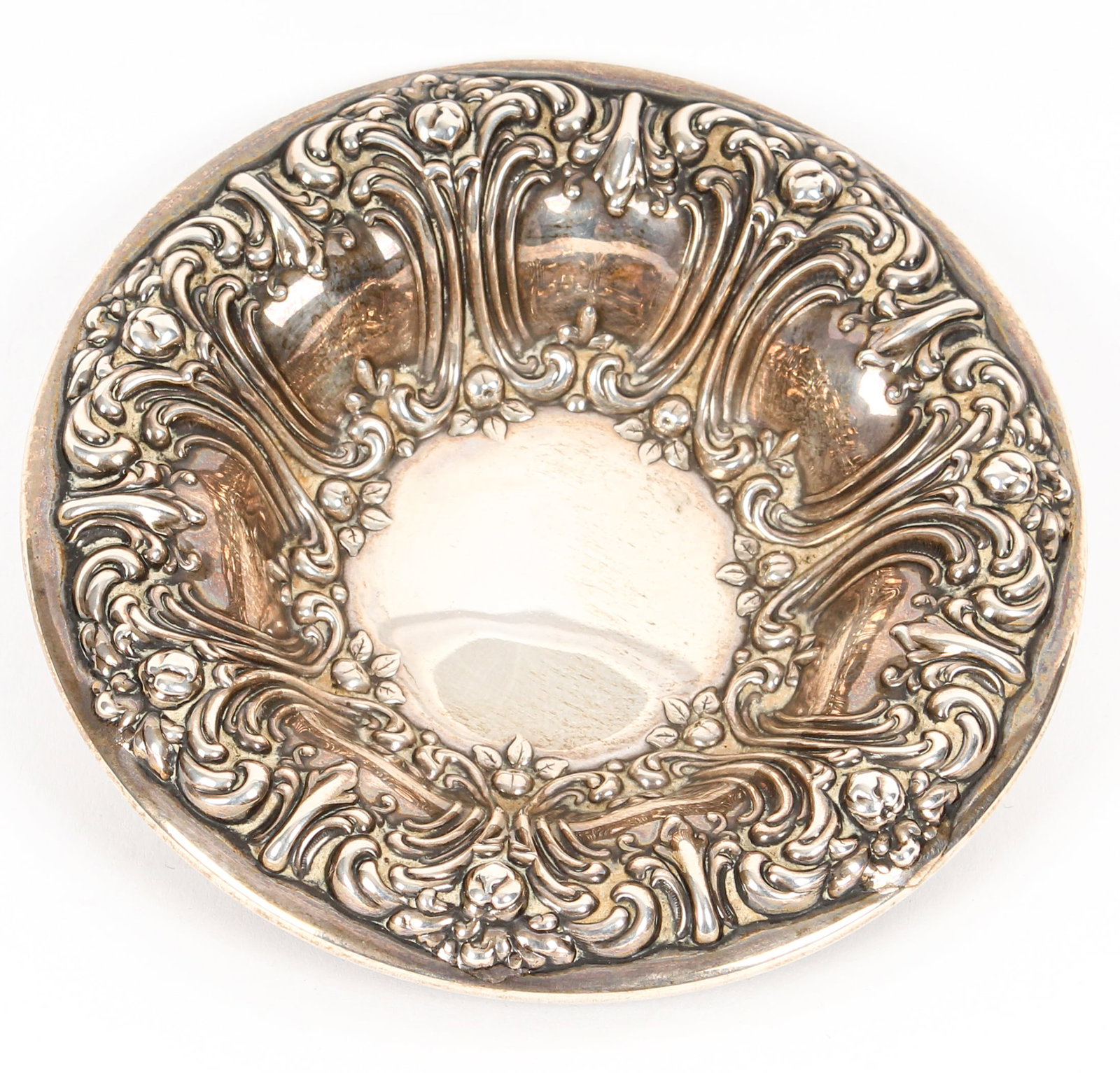Repousse Sterling Silver Bowl, Frank M Whitting & Co.: Description: An ornate repousse decorated sterling silver bowl. Markings & Inscriptions: Marked Date: Early 20th century Maker: Frank M. Whiting & Co. Dimensions: The total weight is 3.08 ozt. 5.5" x 
