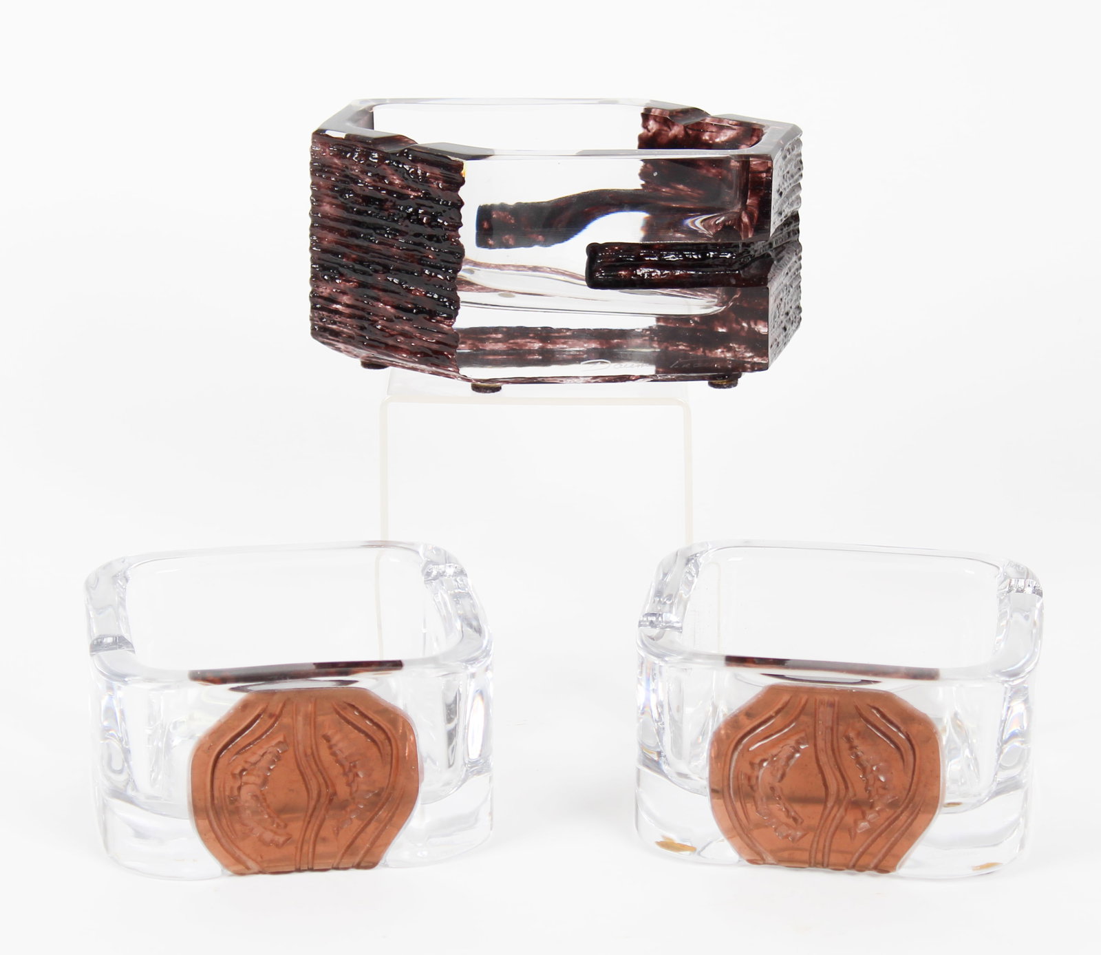 Daum Crystal Ashtrays: Description: Two modern Daum crystal ashtrays. Markings & Inscriptions: Marked Date: Late 20th century Maker: Daum Dimensions: 3" x 6" x 3.5", 2.5" x 4.75" x 4.75".. Provenance: From a Blue Bell, Penn