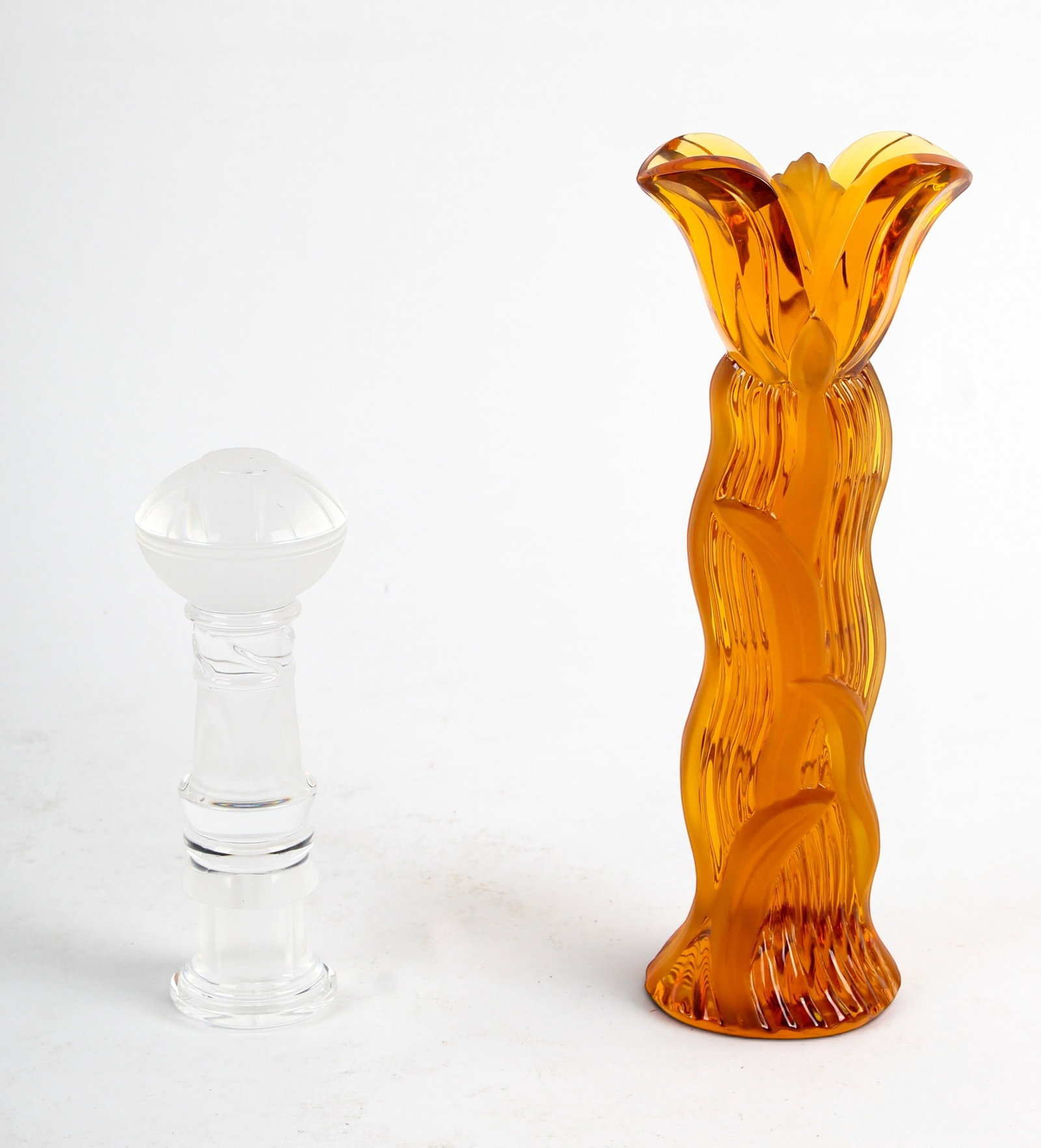 Two St. Louis Crystal Totems: Description: Two free-standing art glass sculptures. Markings & Inscriptions: Marked Date: Late 20th century Maker: Daum Dimensions: Larger: 9.25" H. Smaller: 6" H.. Provenance: From a Blue Bell, Penn