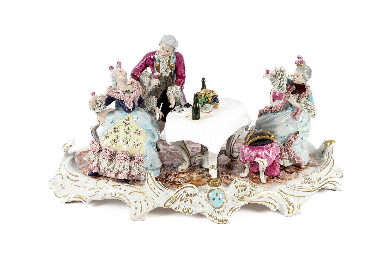 Dresden Muller Volkstedt German Porcelain Lace Figural Group: Description: A Dresden porcelain figural group in the form of aristocrats socializing around a table. Each piece decorated with polychrome enamels and the ladies and the gentleman with hand-applied la