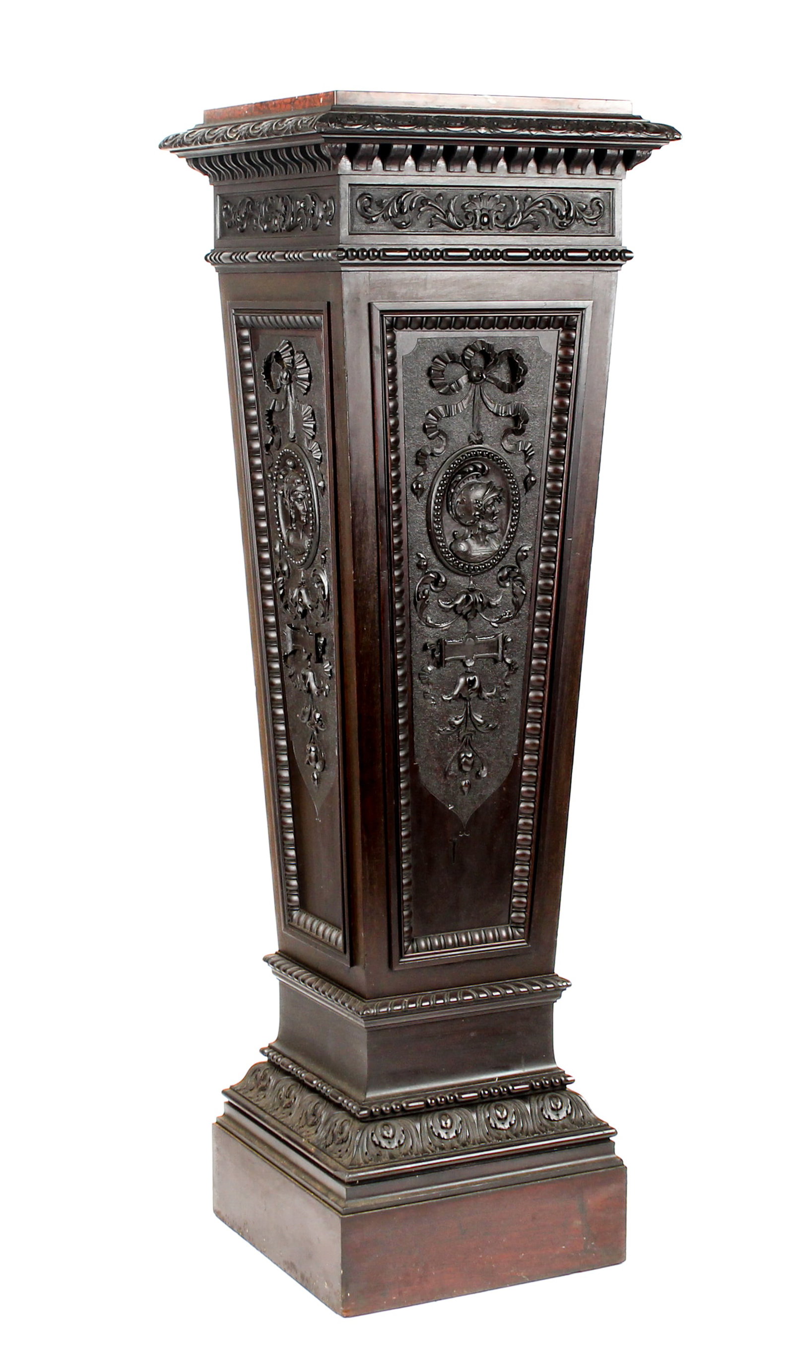 Continental Renaissance Revival Carved Wood & Red Marble Topped Pedestal Ca. 1900: Description: A large carved wood pedestal with red marble top, the four side panels decorated with knights' heads. Markings & Inscriptions: Unmarked Date: Ca. 1900 Maker: Continental Dimensions: 46" x