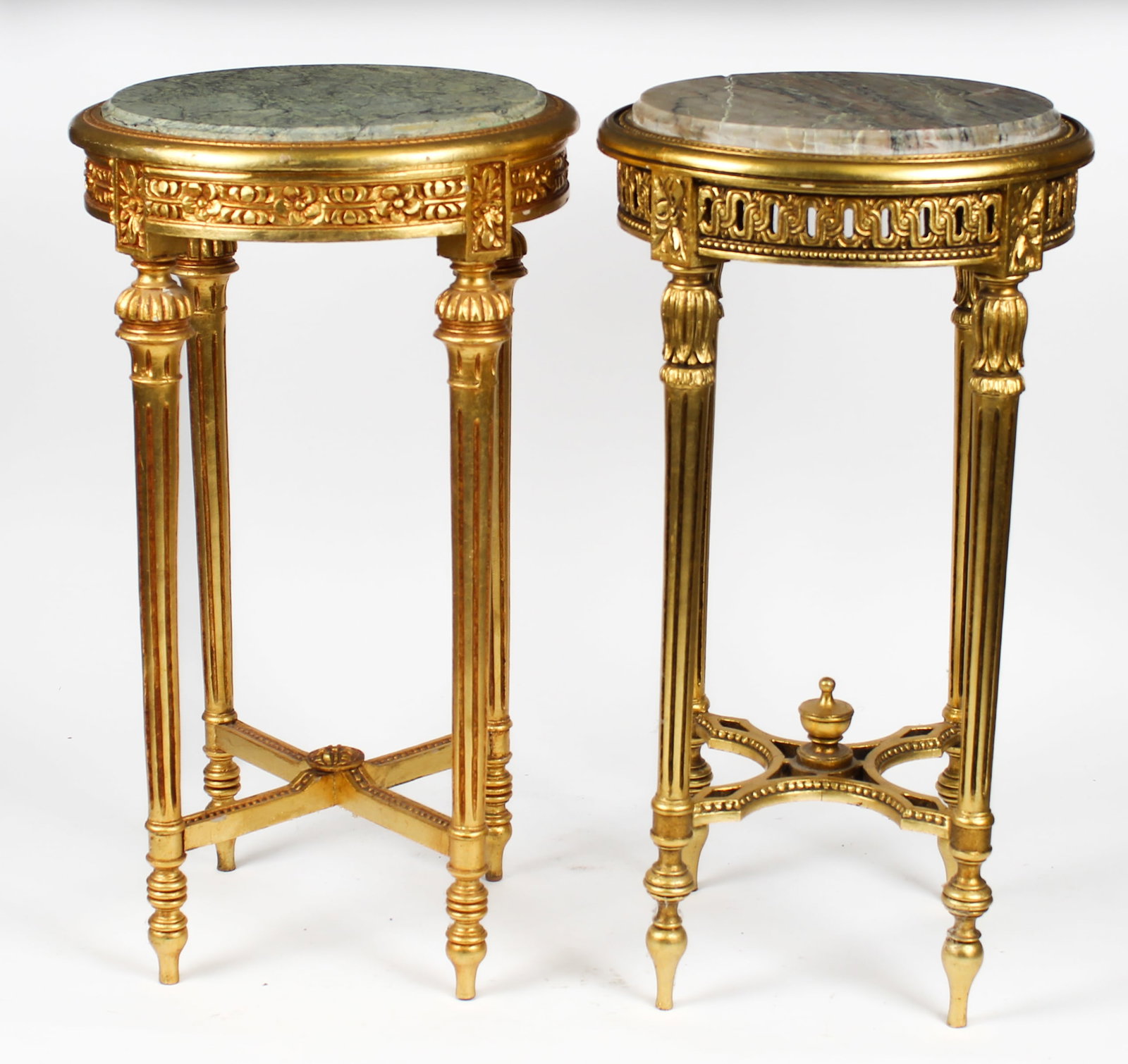 Two Louis XVI Style Giltwood and Marble Inset Stands: Description: Two Louis XVI style giltwood and marble inset stands. The smaller having an openwork carved frieze over fluted, tapering legs ending in turned feet and a carved, 'X' form horizontal stret