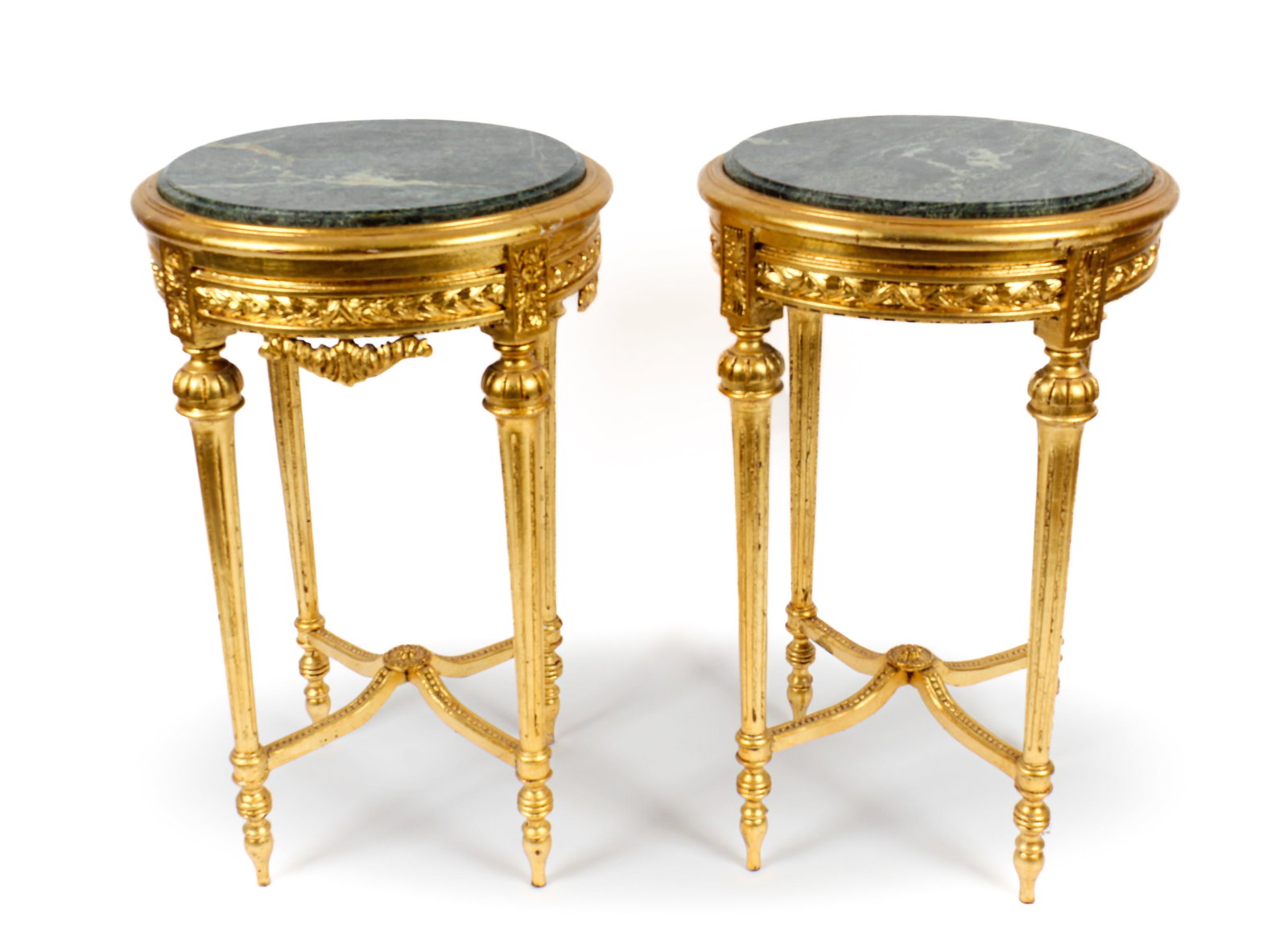 Near Pair Louis XVI Style Giltwood and Marble Inset Stands: Description: A near pair of Louis XVI style giltwood and marble inset stands. Both stands with a carved frieze over fluted and tapering legs, joined by a horizontal 'X' form stretcher and turned feet.