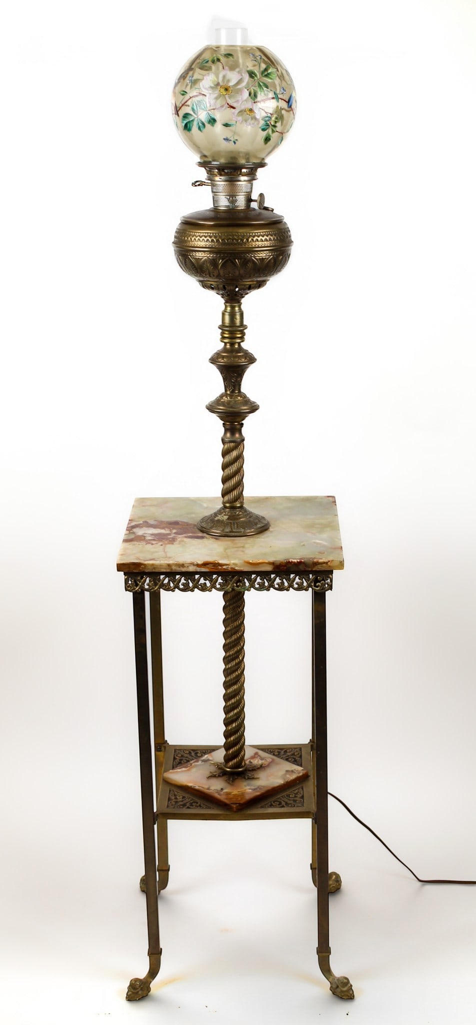 Victorian Brass & Onyx Piano Lamp: Description: A brass and onyx floor lamp with hand painted glass globe shade. Markings & Inscriptions: Unmarked Date: Late 19th/early 20th century Maker: Continental Dimensions: 53.5" H., 61.5" H to t