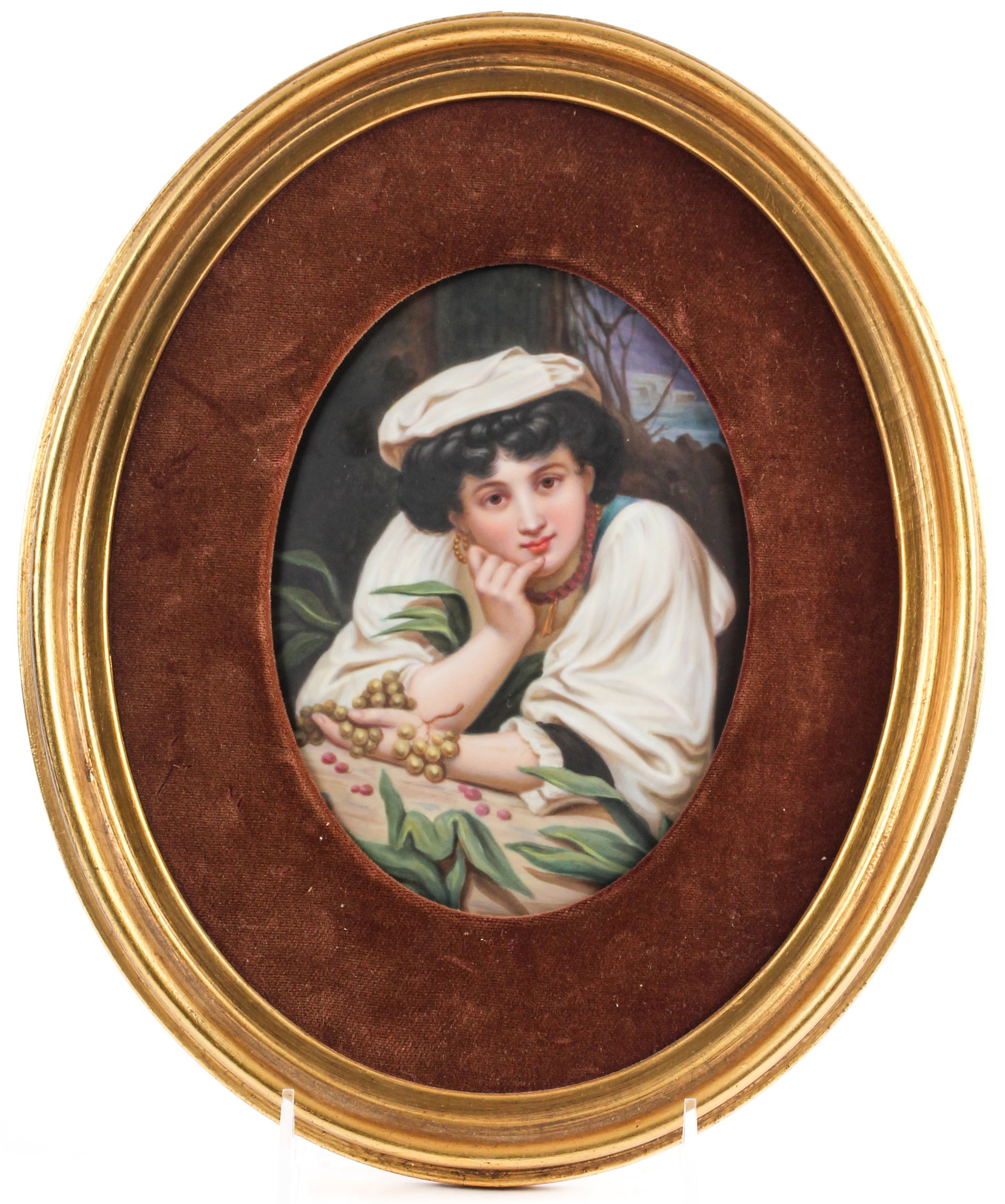 Berlin Porcelain Portrait Plaque, Young Woman With Grapes: Description: A hand painted Berlin porcelain plaque featuring a depiction of a young woman holding a handful of grapes. Markings & Inscriptions: Unmarked Date: Late 19th century Maker: German Dimensio
