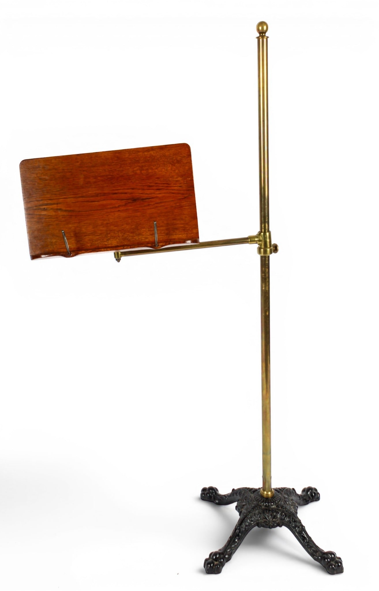 Victorian Adjustable Brass and Oak Reading Stand, Cast Iron Base: Description: Victorian brass and oak reading stand with a rectangular rest on an ajustable arm. Supported by a cast iron base with incorportated paw feet. Markings & Inscriptions: Unmarked Date: Late 