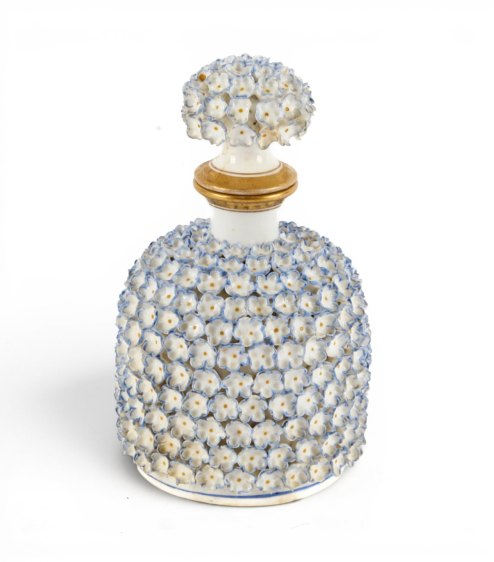 Worcester Porcelain Applied Flowers Scent Bottle: Description: A porcelain scent bottle with blue applied flowers and gilt rim to bottle and stopper. Additional Royal Worcester items from the estate of Stuart Brown will be featured in our upcoming au