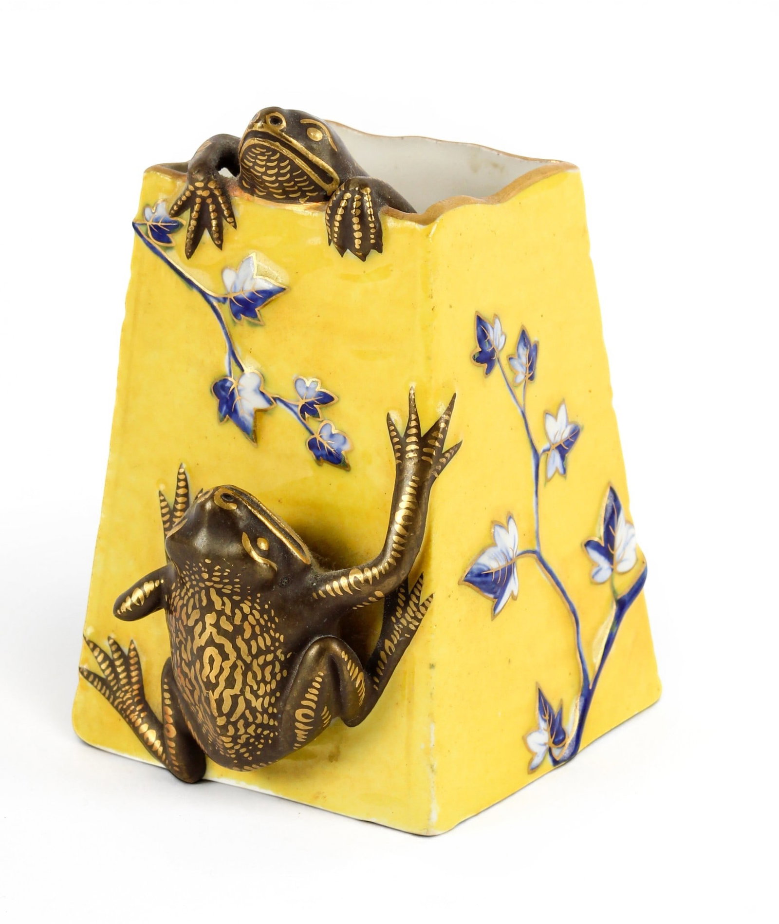 Royal Worcester Porcelain Frog Vase: Description: A porcelain Japanesque vase decorated with applited gilt figures of frogs and blue and white hand painted flowers in low relief on a yellow body. Additional Royal Worcester items from the