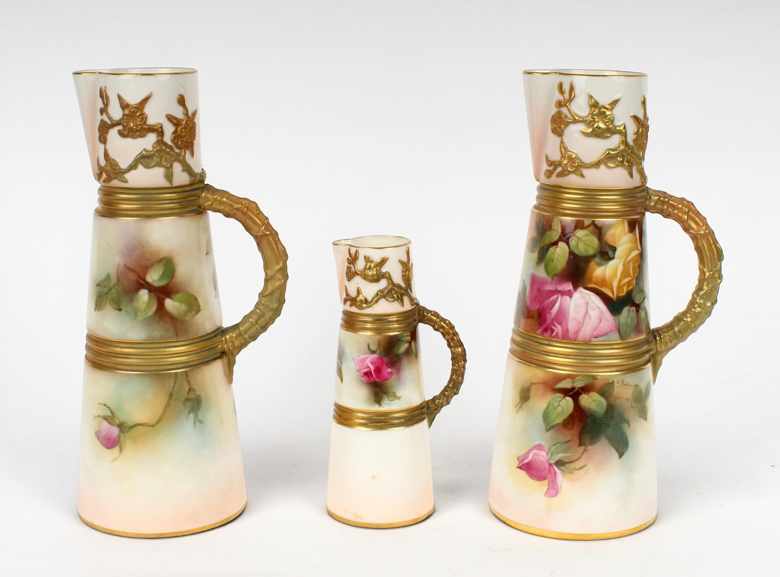 Group of Three Royal Worcester Blush Ivory Porcelain Claret Jugs (1 of 6)