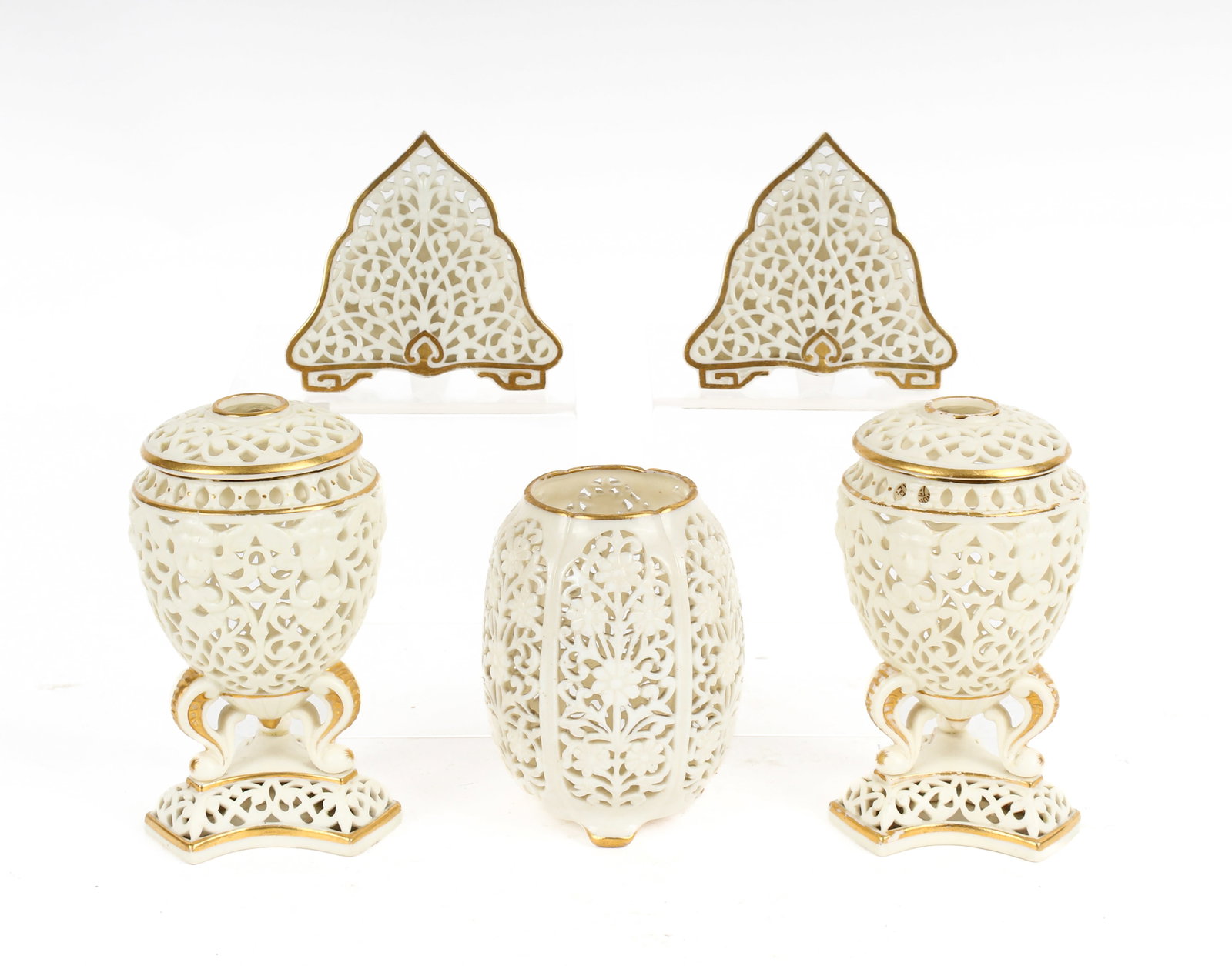 Grainger Worcester Reticulated Porcelain Potpourri, Vase, Menu Holders: Description: Five pierced porcelain items with gilt elements including two lidded potpourri jars, a footed vase with floral decoration, and two menu holders. Additional Royal Worcester items from the 