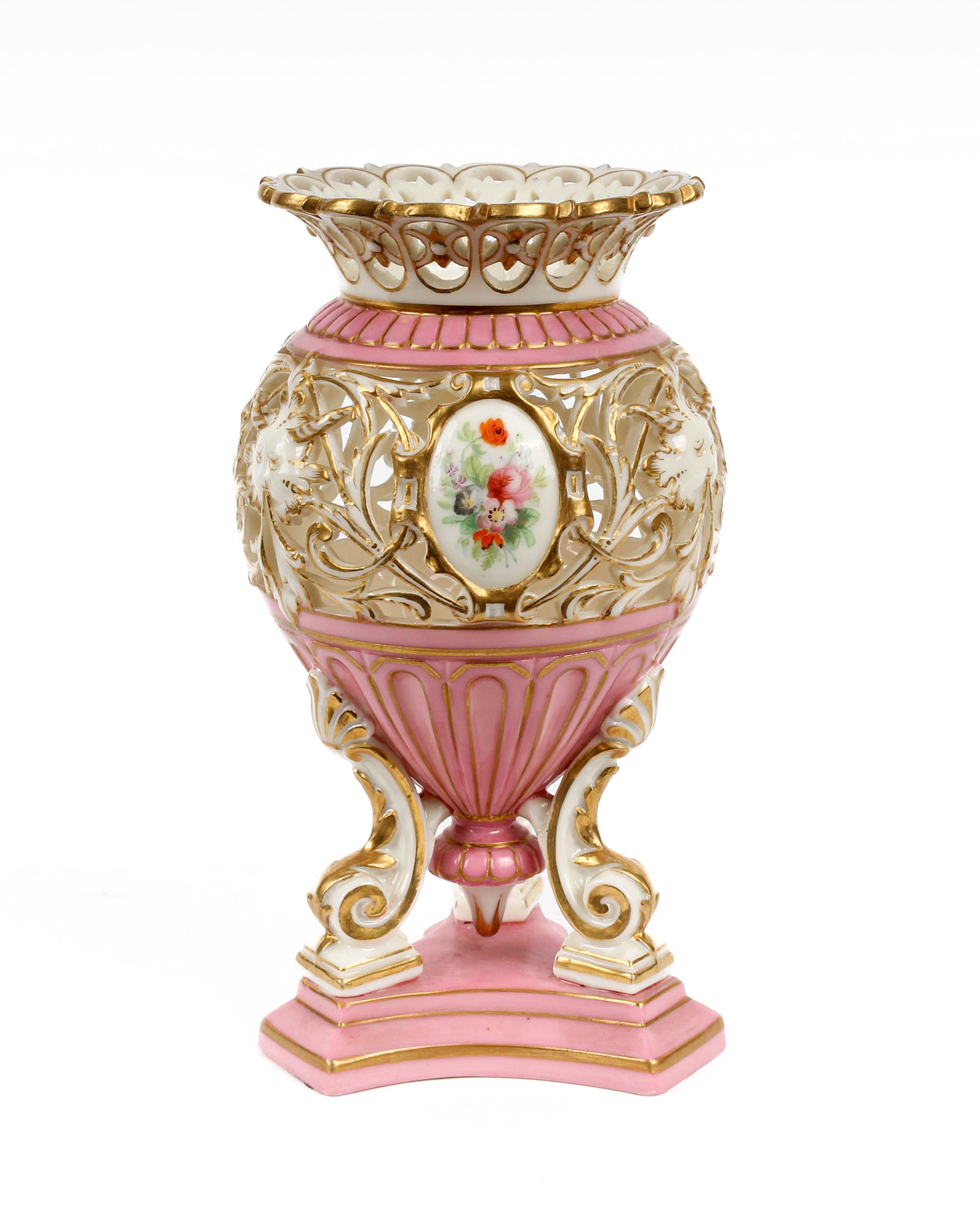 Grainger Worcester Reticulated Porcelain Vase: Description: A pierced porcelain vase decorated with hand painted flowers and classical faces with gilt highlights and a pink ground. Additional Royal Worcester items from the estate of Stuart Brown w