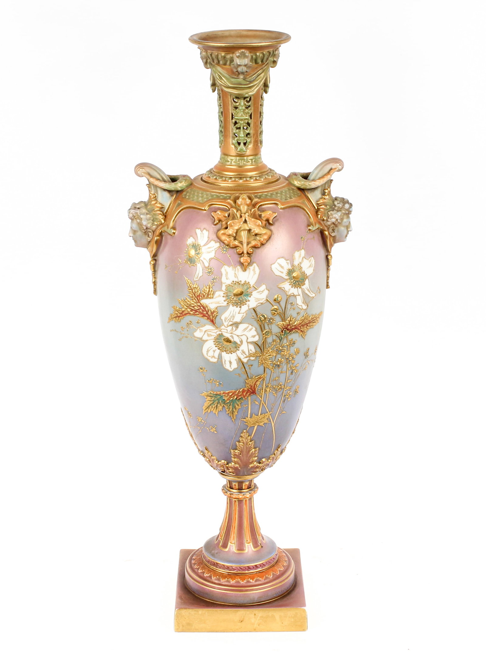 Large Royal Worcester Porcelain Handled Vase: Description: A large porcelain vase with pierced neck, decorated with naturalistic and neoclassical motifs with gilt highlights, in primarily blue, purple, and orange tones, with a matte surface. Shap