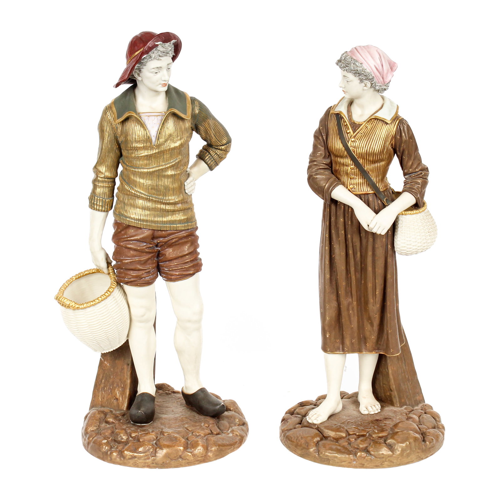 Large Royal Worcester Figures of French Fisher Boy and Girl, James Hadley: Description: Two large porcelain figures of a fisher boy and girl, the boy holding a basket and the girl with a fishing creel strapped across her shoulder, each decorated in brown tones with gilt high