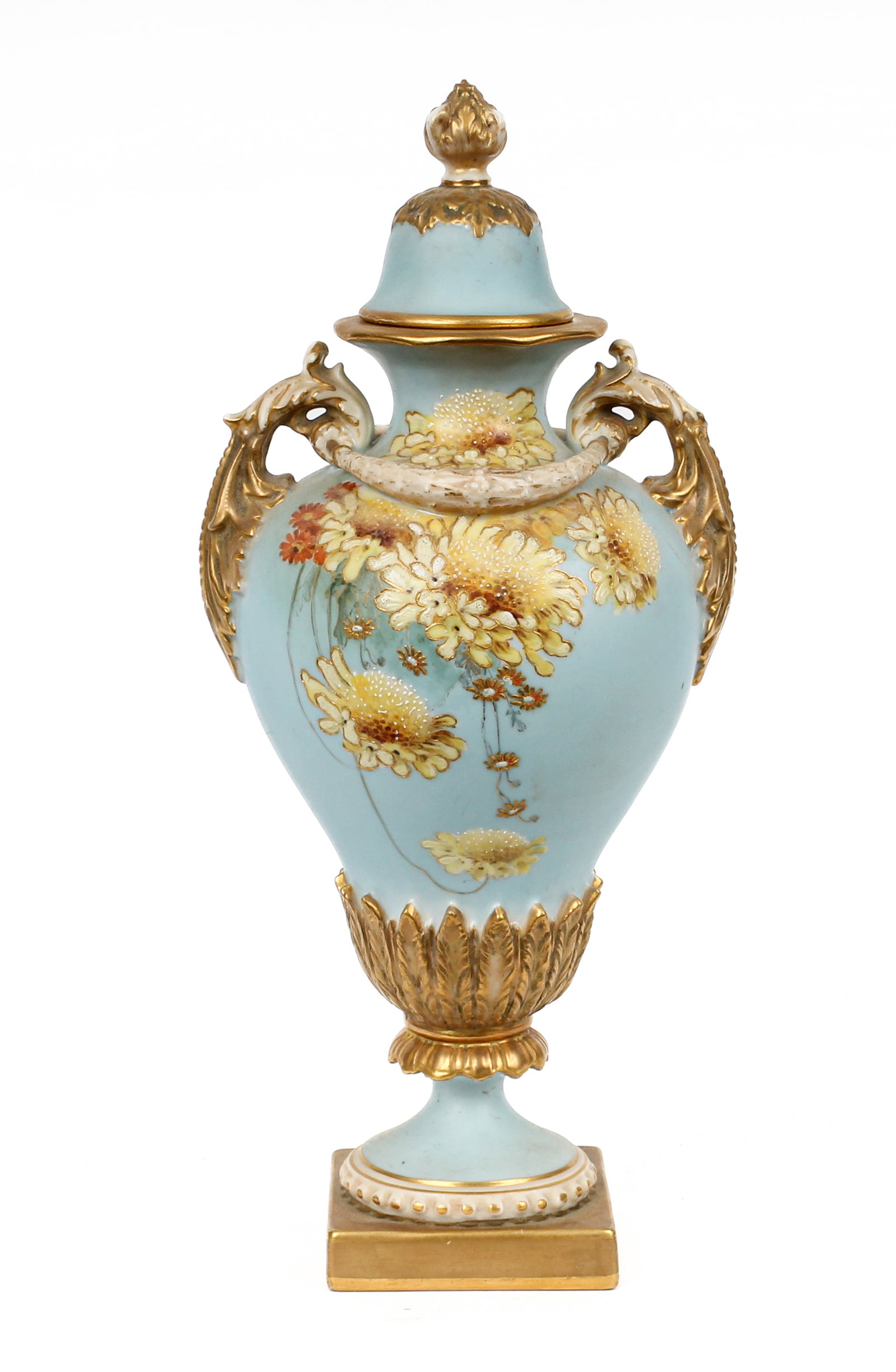 Royal Worcester Porcelain Lidded Urn Decorated with Daisies, 1897: Description: A lidded porcelain urn decorated with hand painted daisies on a soft blue ground, with gilt elements. Shape 1937. Additional Royal Worcester items from the estate of Stuart Brown will be 