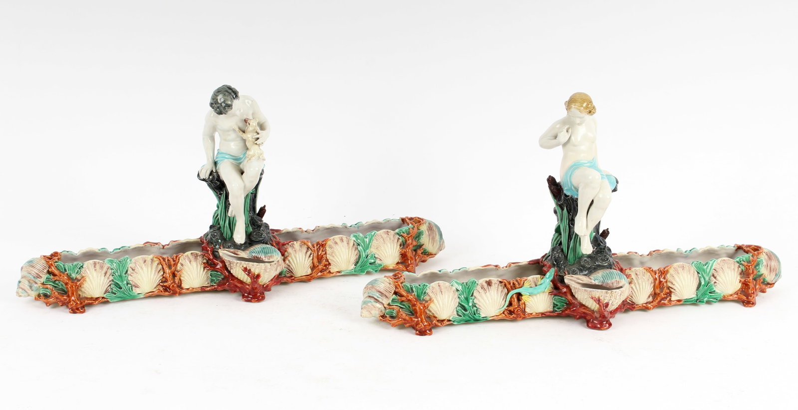 Royal Worcester Centerpiece Vases, James Hadley: Description: Two Worcester ceramic or majolica vase centerpiece ferner or stem vases, decorated with semi-nude female and male figures and various seashells, designed by James Hadley and bearing an im