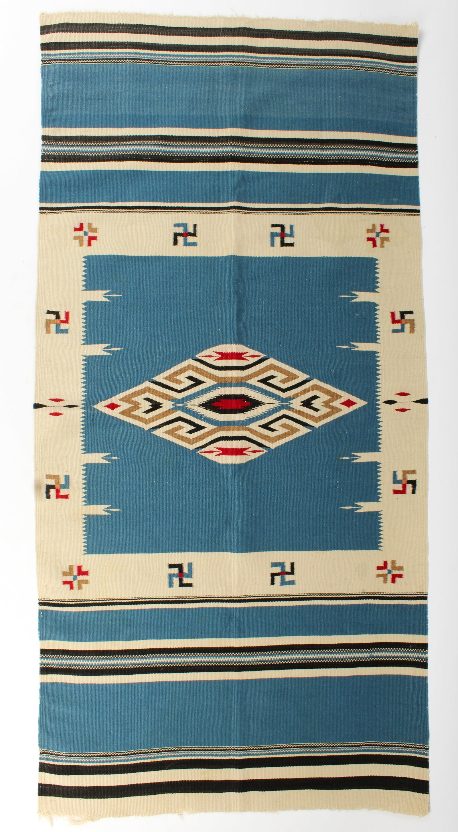 1930s Chimayo Wool Rug Weaving: Description: A Chimayo weaving in primarily blue and black tones with central geometric medallion. Markings & Inscriptions: Unmarked Date: 1930s Maker: Chimayo, New Mexico Dimensions: 54.5" x 25.5" Pr