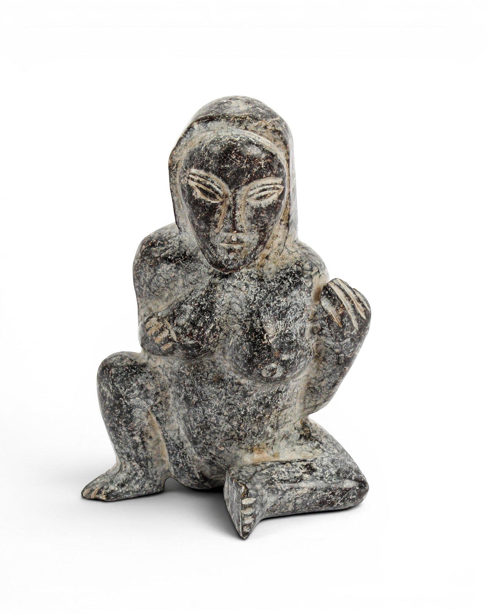 Inuit Carved Soapstone Figure of a Nude Seated Female: Description: Inuit carved soapstone figure of a nude female. Markings & Inscriptions: No visible signature Date: 20th Century Maker: Inuit Dimensions: Height: 8". Provenance: From a Yardley, Pennsylva