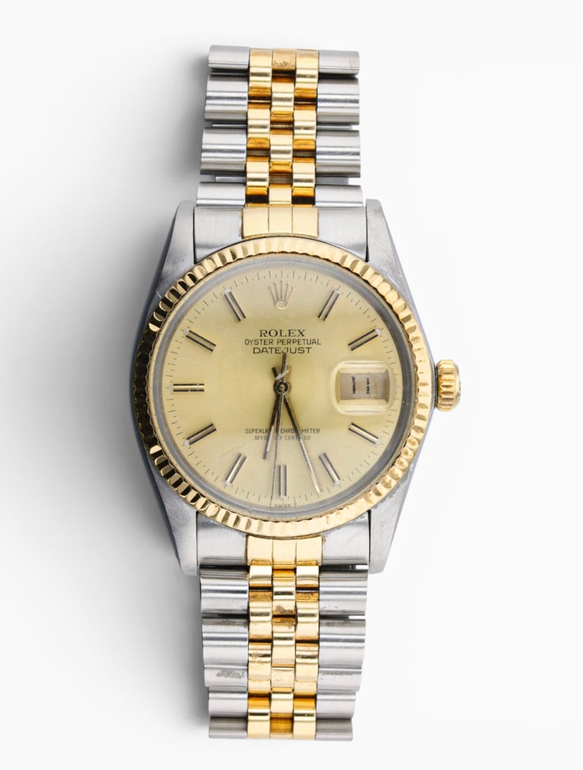 Men's Rolex DateJust Watch Ref. 16013: Description: A 36mm stainless steel and 18k yellow gold case, fluted bezel, champagne dial, Rolex Datejust Watch Ref.16013 Markings & Inscriptions: Org. Rolex Design 16013; Stainless Steel 8505xx Date