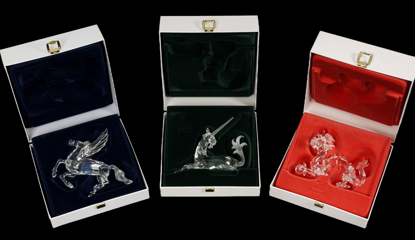 Swarovski Crystal Fabulous Creatures Dragon, Unicorn, Pegasus Figurines: Description: A dragon and pegasus from the Fabulous Creatures series, with the original boxes and paperwork. Markings & Inscriptions: Marked Date: 1996, 1997, 1998, Maker: Swarovski Dimensions: The bo