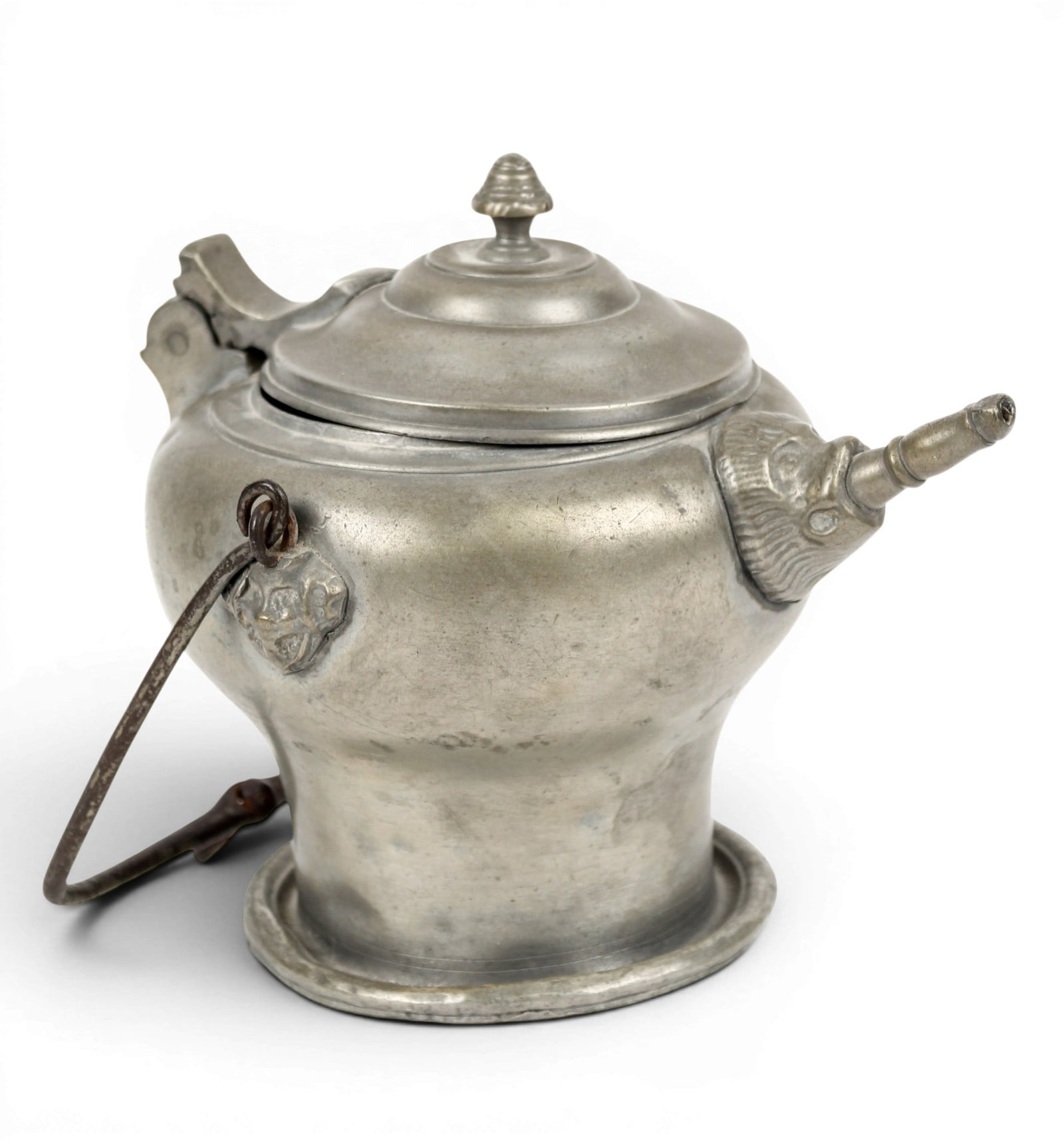 Swiss Pewter Sugerli, 18th Century: Description: A Swiss pewter sugerli or baby bottle with lion's head spout and wrought iron handle. Markings & Inscriptions: Marked on the underside of the base Date: Mid to late 18th century Maker: Sw