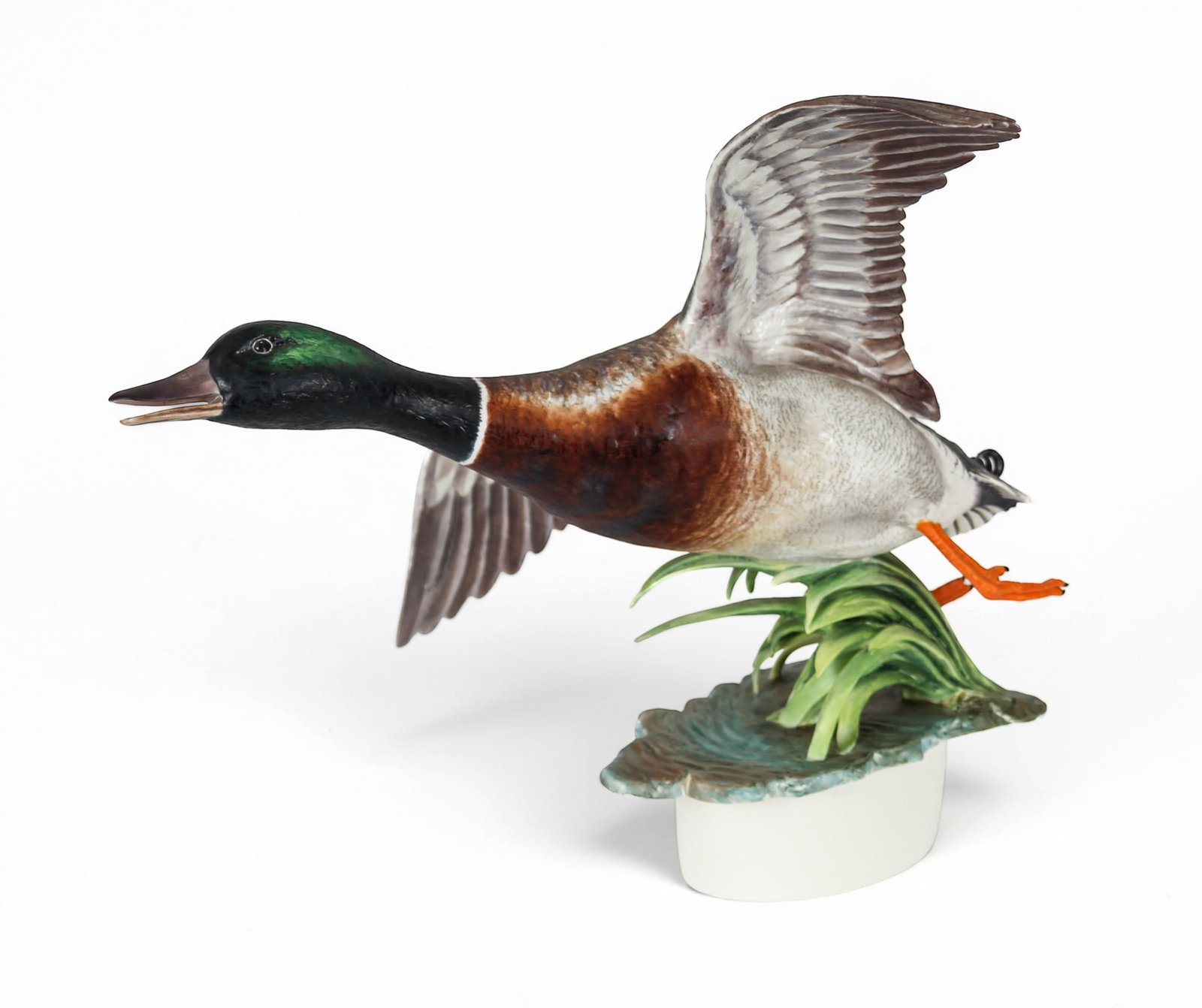Royal Worcester Ronald Van Ruyckevelt Hand-Painted Porcelain "Mallard" Figure: Description: Royal Worcester polychrome hand-painted porcelain "Mallard" modeled by Ronald Van Ruyckevelt. The duck depicted in flight with wings outstretched. Markings & Inscriptions: Marked to the u