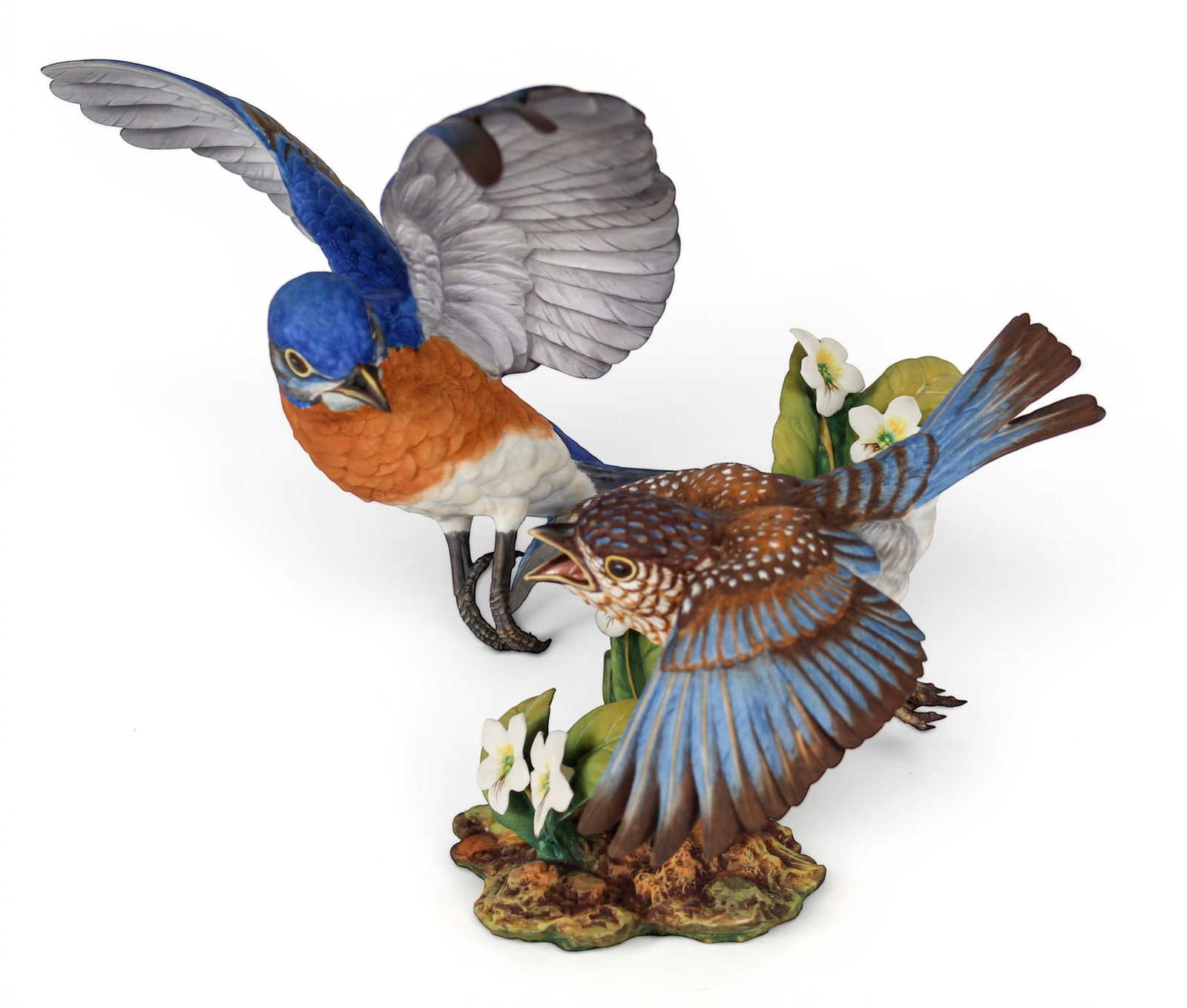 Hutschenreuther Gunther R. Granget Porcelain Hand-Painted Bird Grouping "The Reluctant Fledgling": Description: Limited edition polychrome hand-painted porcelain grouping titled "The Reluctant Fledgling" depicting a female Eastern Bluebird and her fledgling in a naturalistic setting with leaves and