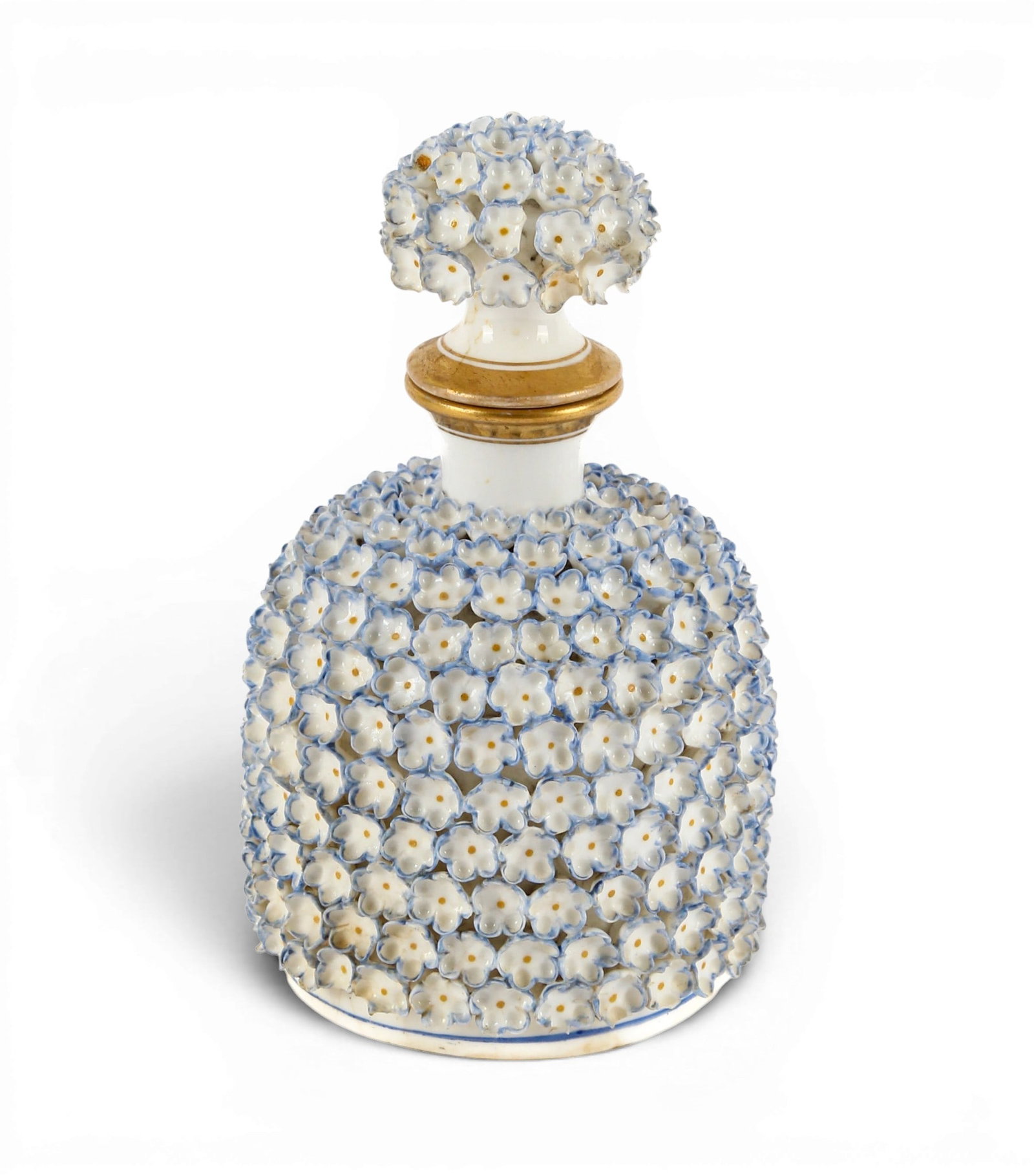 Worcester Porcelain Applied Flowers Scent Bottle: Description: A porcelain scent bottle with blue applied flowers and gilt rim to bottle and stopper. Additional Royal Worcester items from the estate of Stuart Brown will be featured in our upcoming au