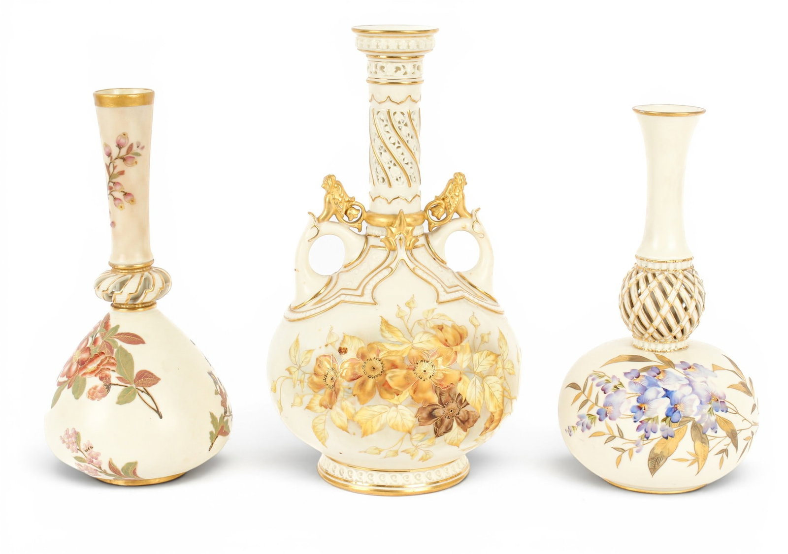 Three Royal Worcester Hand-Painted Porcelain Reticulated or Perforated Vases: Description: Three Royal Worcester Hand-painted porcelain reticulated or perforated vases.The largest with twin gilt decorated handles and a gilt accented, reticulated neck and yellow ochre painted fl