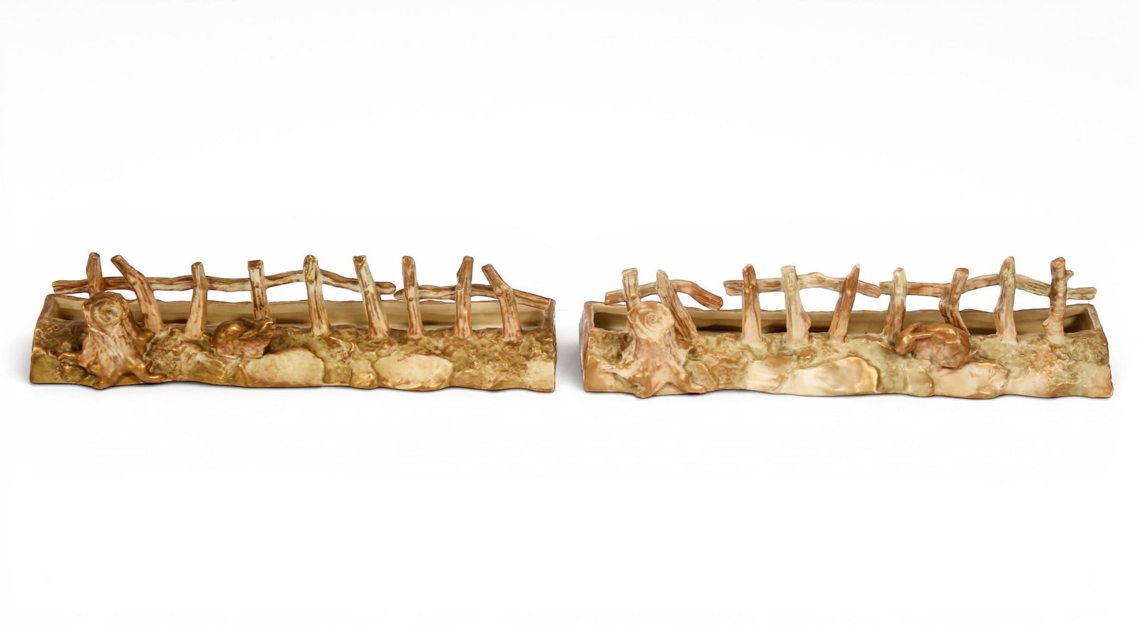 Pair of Royal Worcester Porcelain Fence-Form Posey Holders: Description: Pair of Royal Worcester porcelain fence form trough style posey holders. Each depicting a naturalistic rail fence line with a gilt accented stump and a gilt rabbit. Markings & Inscription
