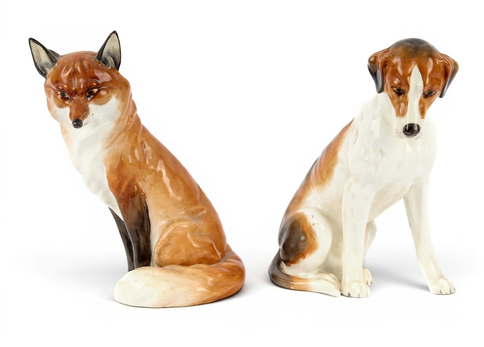 Royal Worcester Porcelain Red Fox and Hound Dog, Doris Linder: Description: Royal Worcester porcelain seated red fox and a seated hound dog. Both model by Doris Linder. Shape number 2993 and 2994. Markings & Inscriptions: Marked to the undersides Date: 20th centu