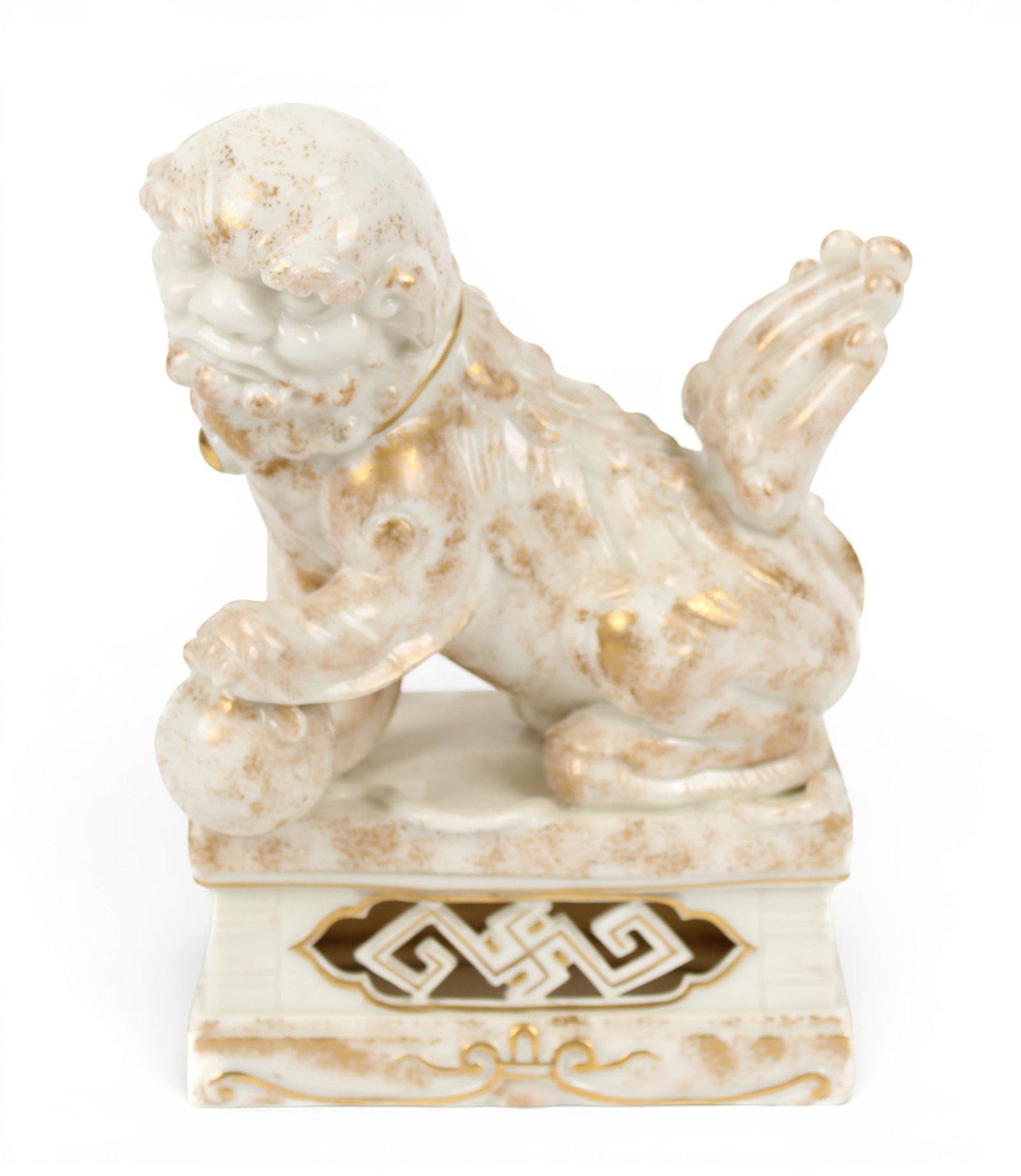 Royal Worcester Porcelain Chinese Foo Dog Candle Holder: Description: A Royal Worcester porcelain Chinese foo dog form candleholder. Modeled as a gilt accented and sponge decorated foo dog with his left foot up on a ball on a pierced, rectangular base. Mark