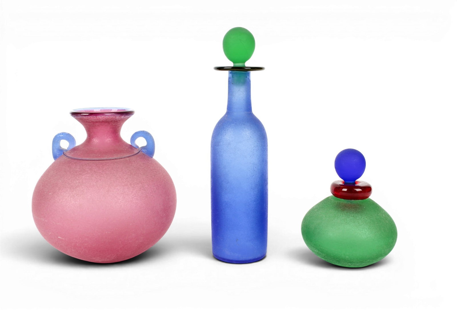 Franco Moretti Murano Scavo Art Glass Vase, Bottles: Description: Three Postmodern art glass vessels by Franco Moretti of Murano. Markings & Inscriptions: Signed Date: 1980s Maker: Franco Moretti Dimensions: Blue bottle: 10.5" H. Green bottle: 5.5" H, 4