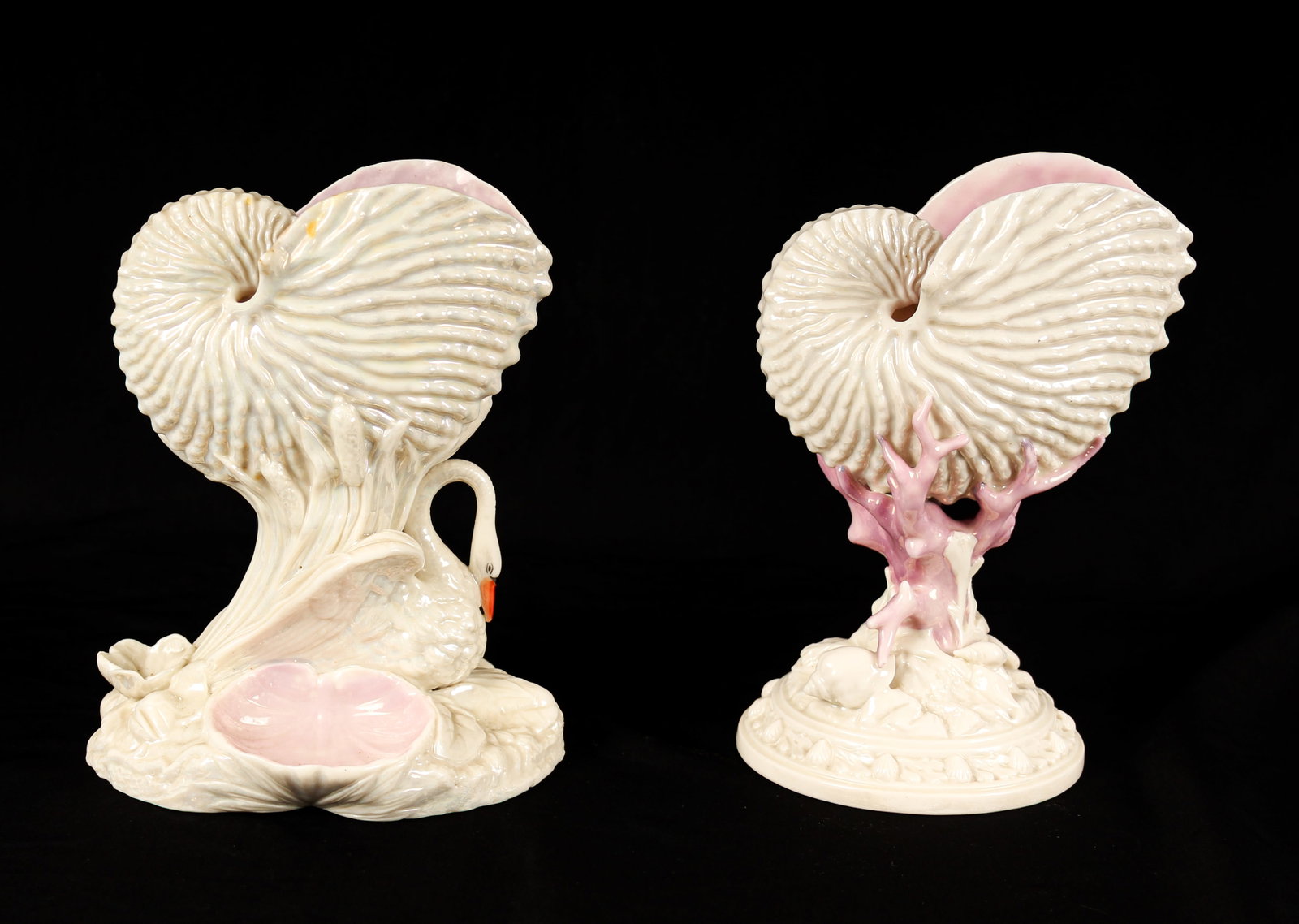 Two Royal Worcester Luster Porcelain Nautilus Shell Vases: Description: Two luster glaze nautilus shell-form vases with pink highlights. Markings & Inscriptions: Impressed mark Date: Mid to late 19th century Maker: Royal Worcester Dimensions: 8.5" x 5.5" x 4.