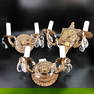 Group of three spanish brass double arm sconces with candle sockets and crystals