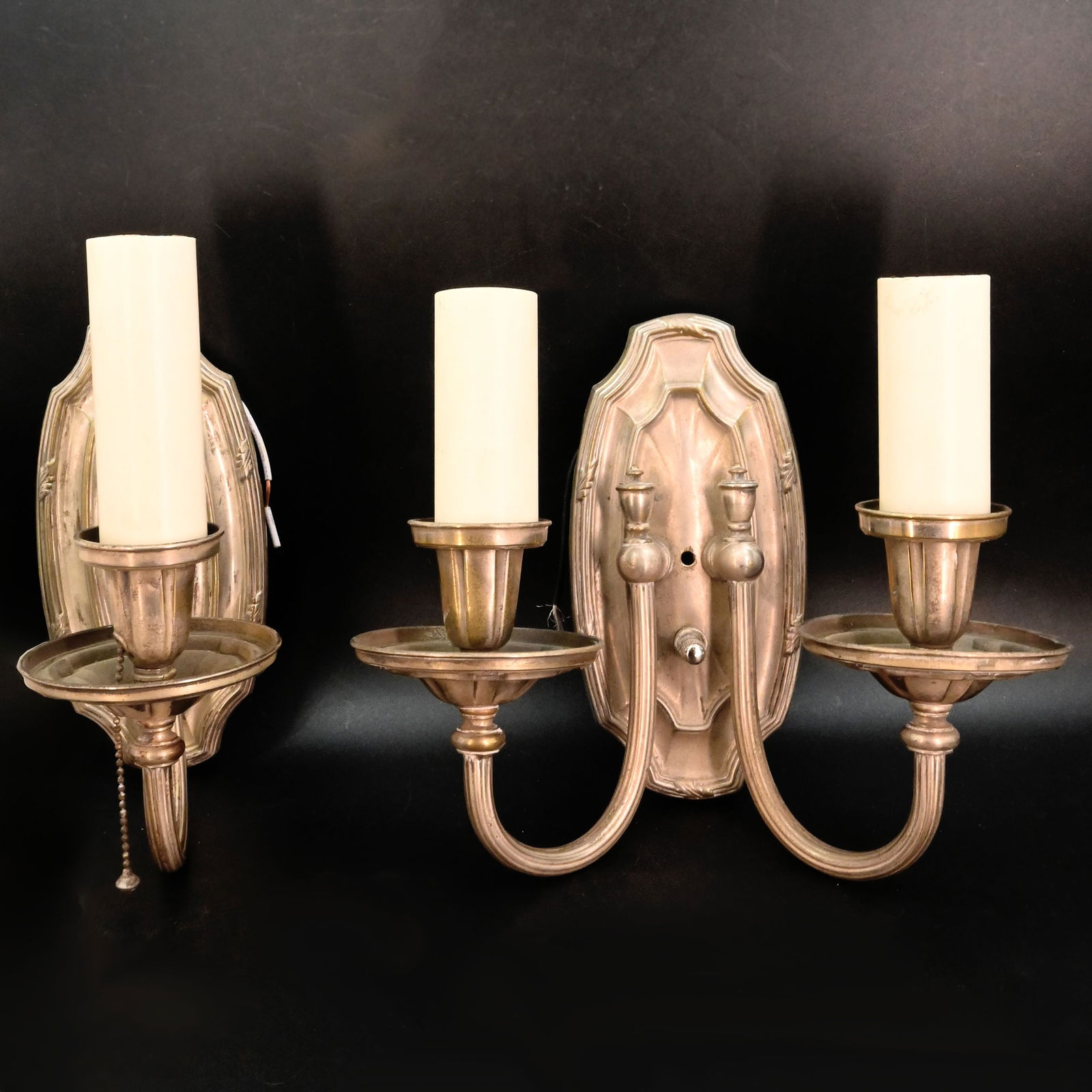 Pair of Silver plated sconces featuring decorative ornamentation on backplate, one is one arm, one (1 of 5)