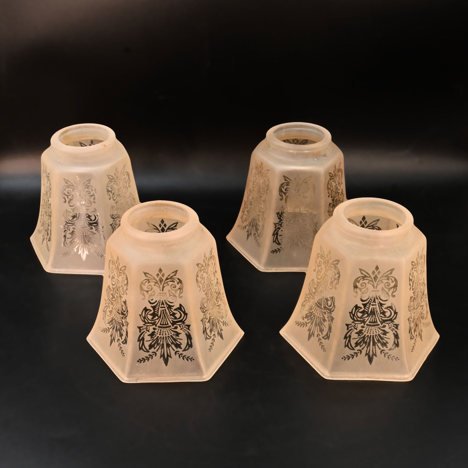 Group of four 2 1/4" fitter amber etched gas/electic cast glass shades with wheat motif (1 of 2)