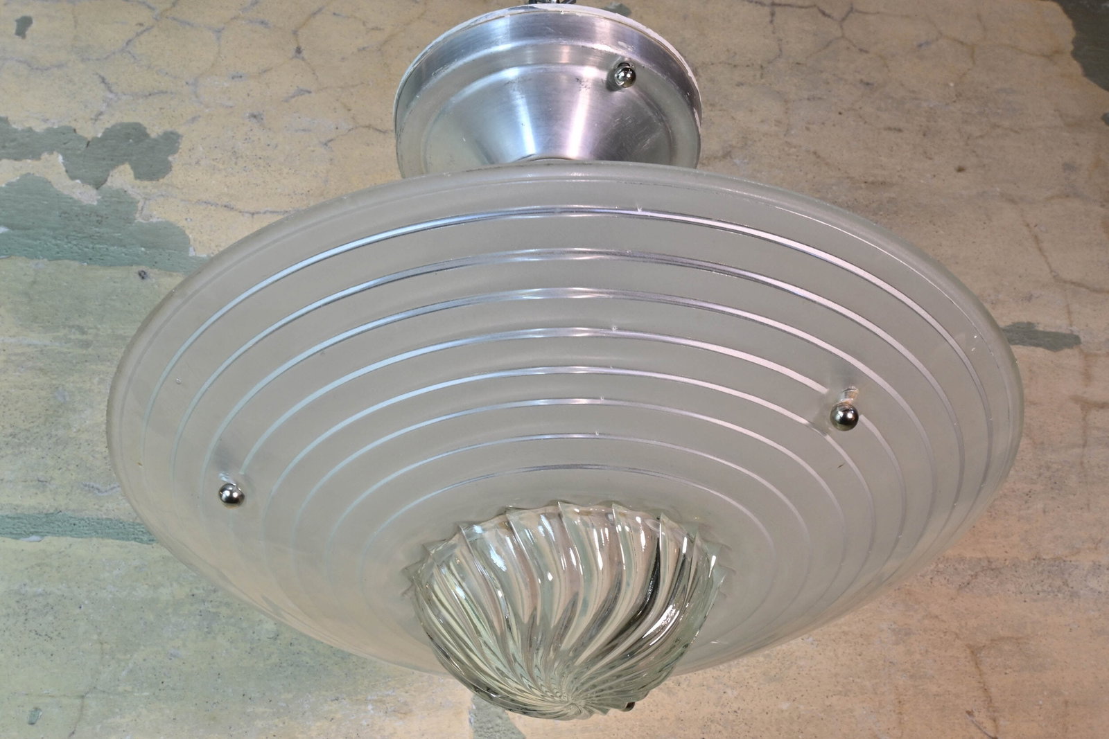 Three chain flushmount with MCM shade: Three chain flushmount with MCM shade. Aluminum and glass. Dimensions: 13” diameter x 12” drop.