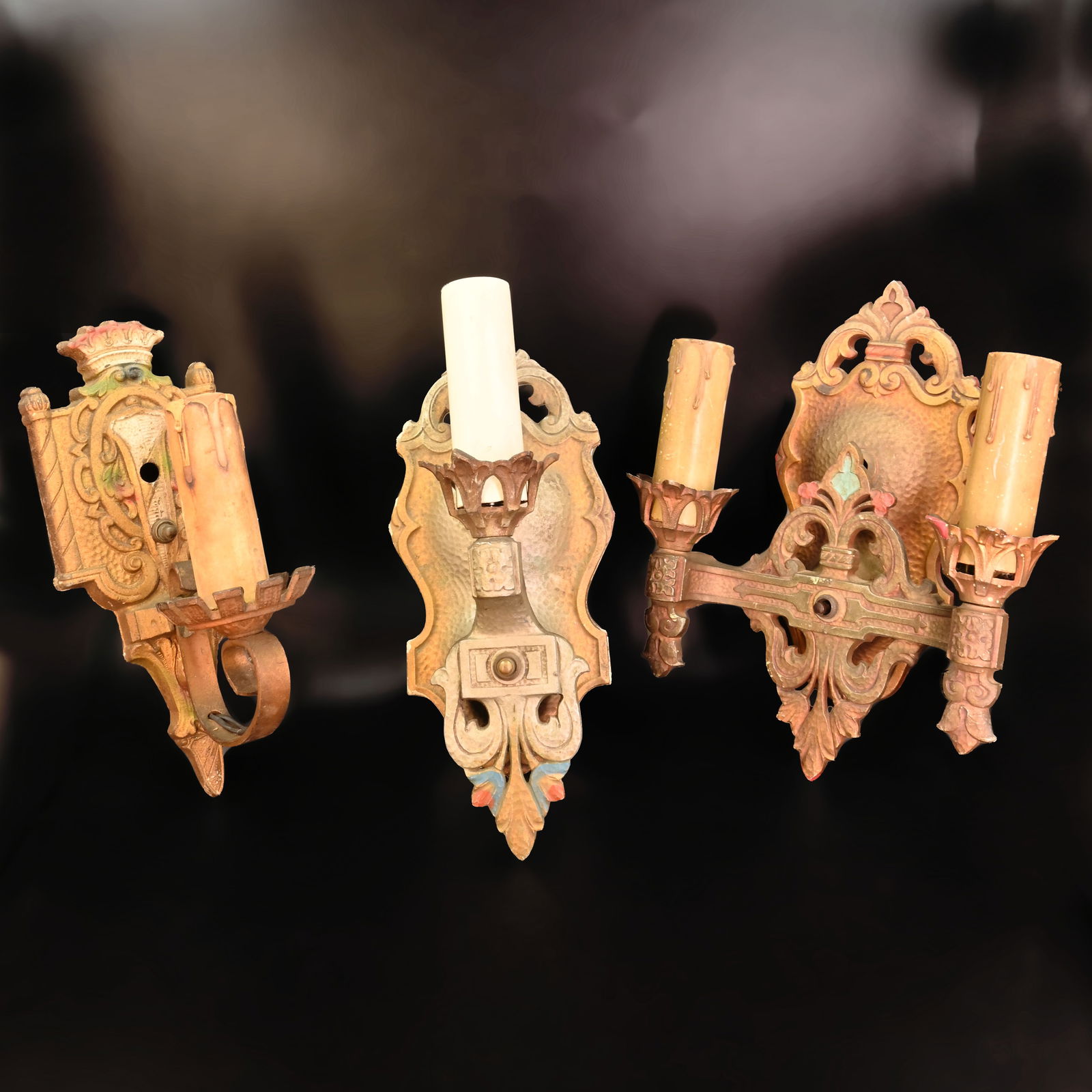 Group of three polychrome cast sconces with floral details (1 of 7)