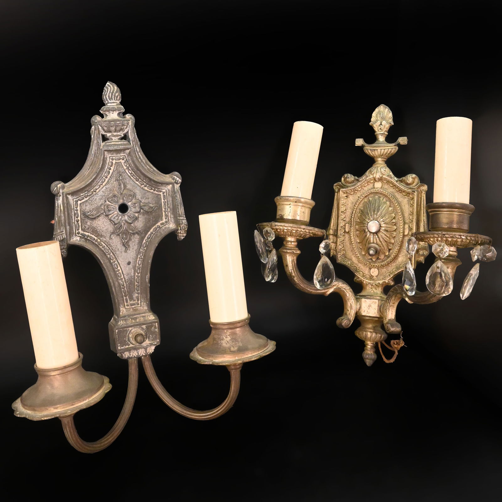 Set of two mismatched silver-tone cast sconces with urn motif (1 of 5)