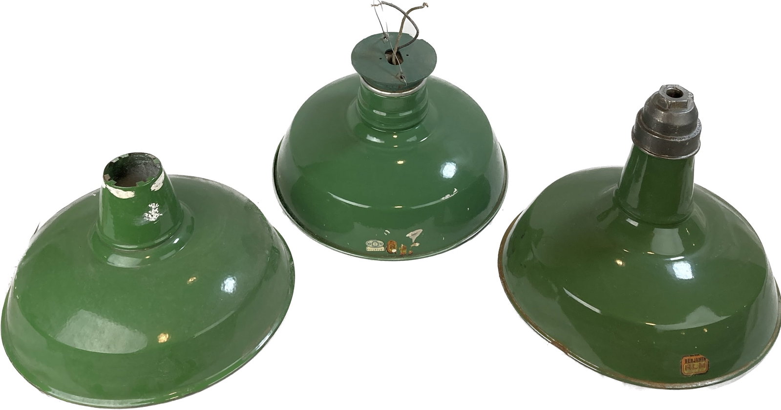 Set of 3 round medium mismatched green enamel warehouse shades: Set of 3 round medium mismatched green enamel warehouse shades. One by Wheeler and one by Benjamin. Appoximately 14" diameter x 8"-11" tall. This item is offered with no reserve.