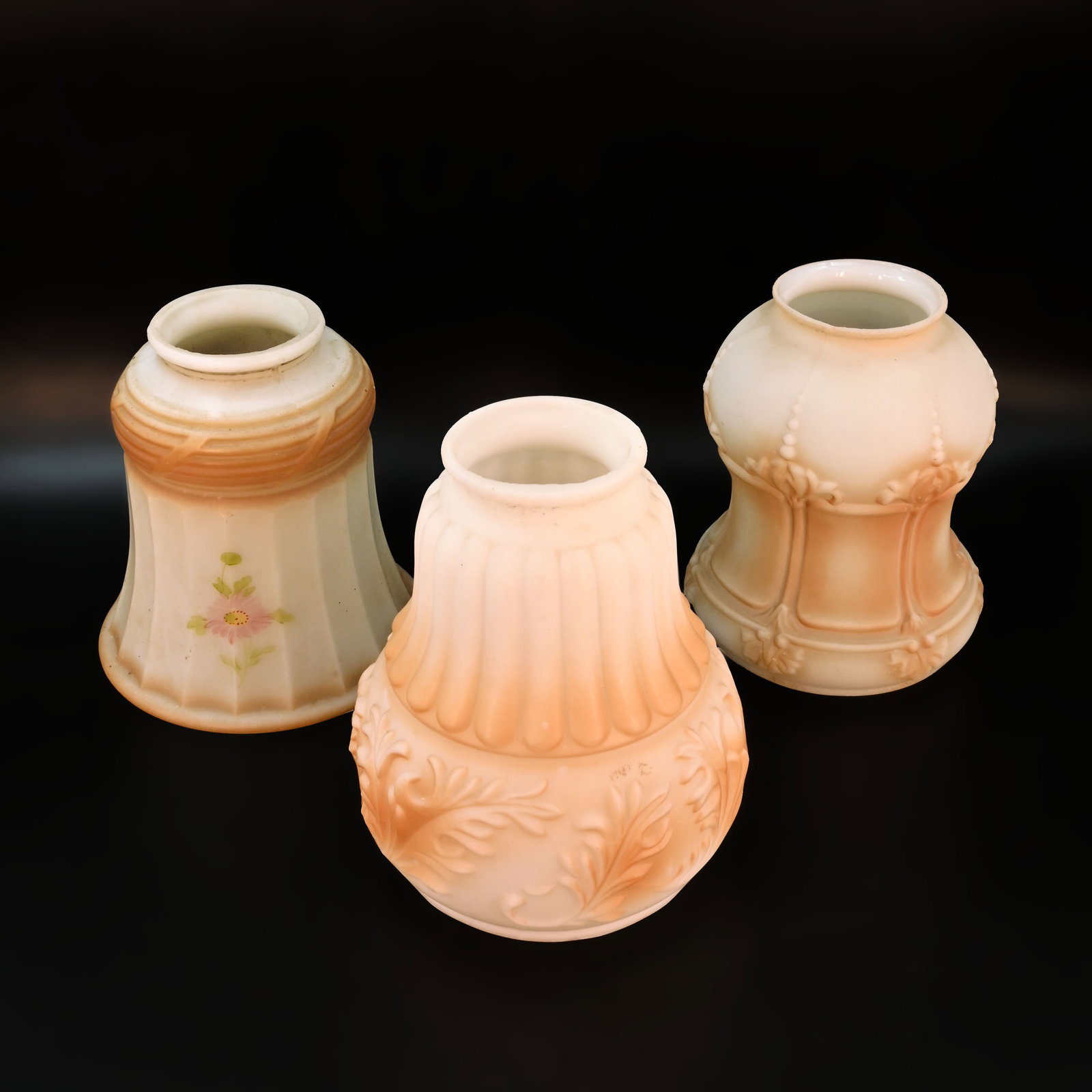 Group of three 2 1/4" fitter mixed design brown painted white glass shades (1 of 4)
