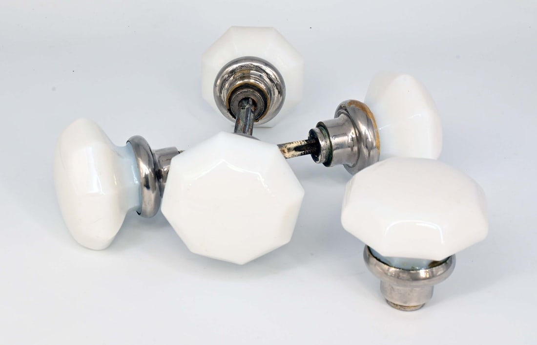 Set of four milkglass & nickel octagonal knob sets: Set of four milkglass & nickel octagonal knob sets. Circa: 1920’s. Condition: Age Consistent. Material: Milk Glass, Nickel over Brass. Finish: Original. Country of origin: USA. Dimensions:Approx