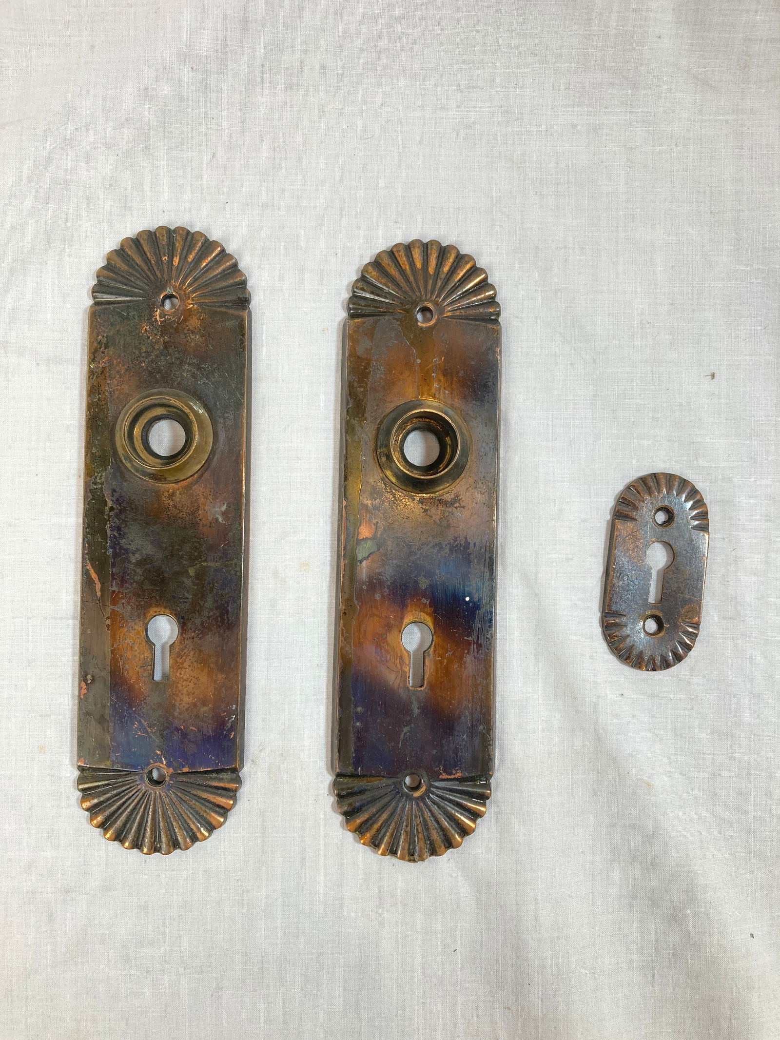 Set of 3 sunburst gilt and satin backplates and keyhole hardware: Set of 3 sunburst gilt and satin backplates and keyhole hardware. Backplates are 7" tall x 1 7/8" wide. This item is offered with no reserve.