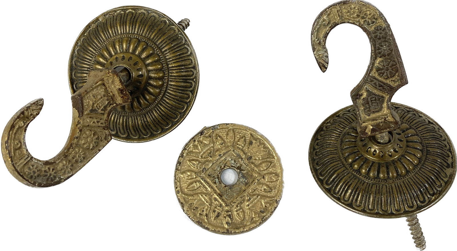 Pair of cast iron hooks with brass rosettes and one original iron rosette (1 of 2)