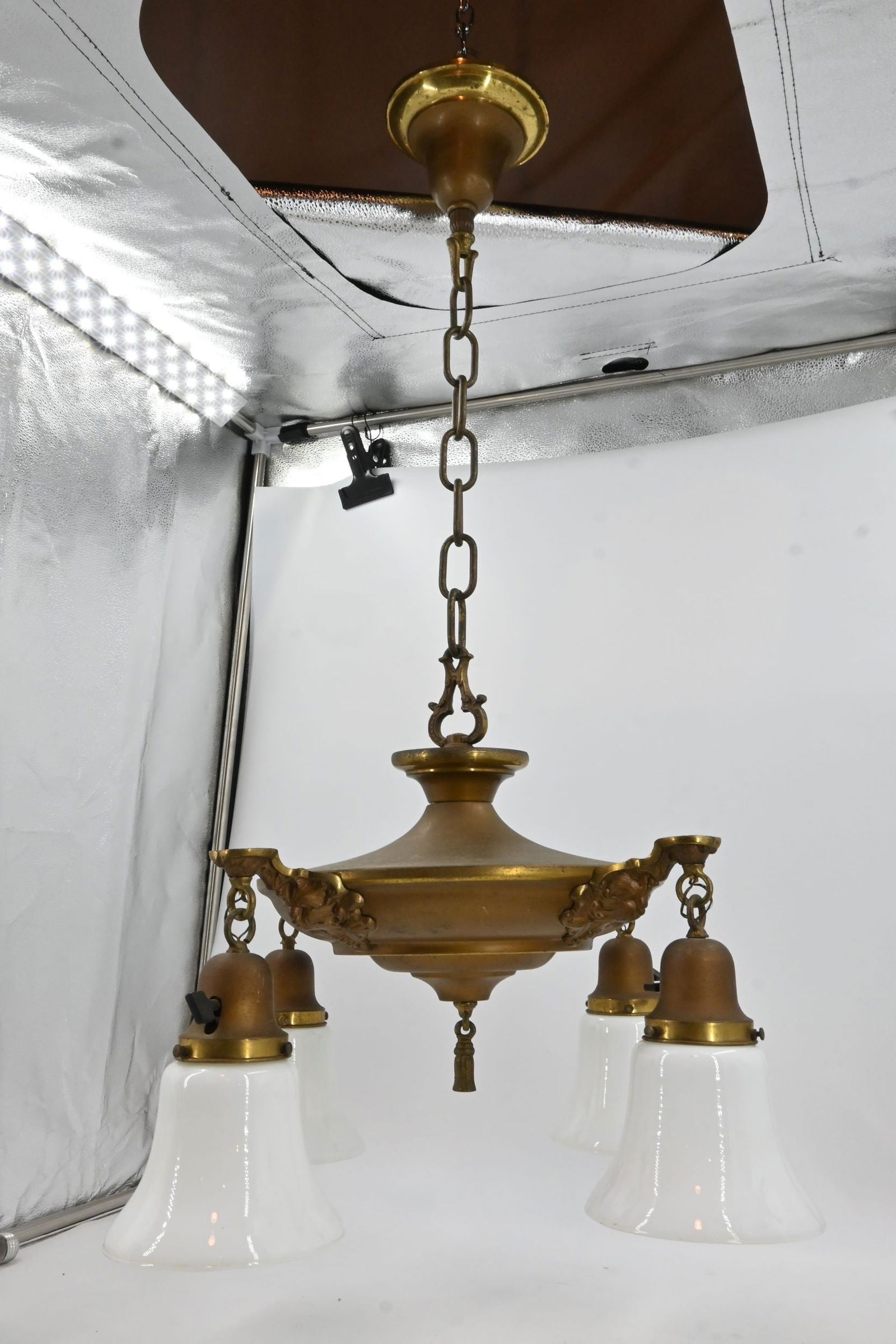 Two tone brass four light pan chandelier with tassel finial and milkglass bell shades (1 of 17)